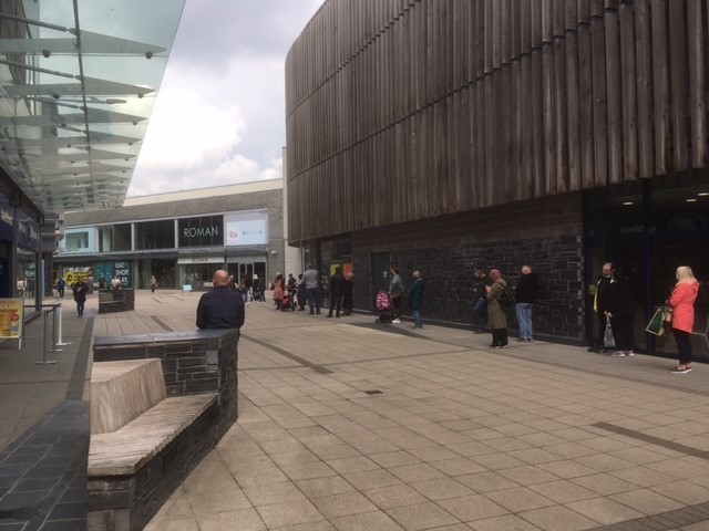 The queue to get into the Debenhams closing down sale at Eagles Meadow, Wrexham