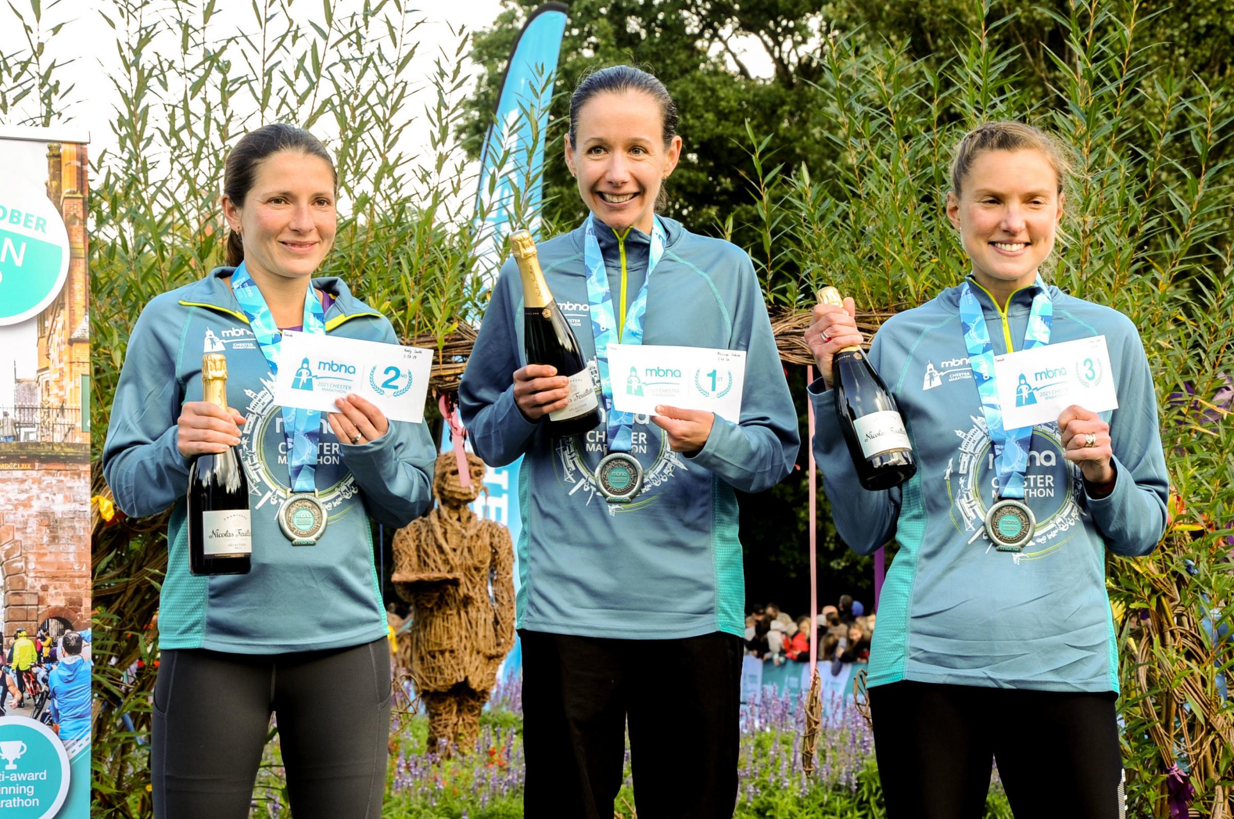 Chester Racecourse start and finish Grosvenor Park, Mbna Chester Marathon, Metric and Mini Marathon. Picture Centre first place Lady Melissah Gibson, second place Keely Smith and third place Alison Taylor. SW03102021.