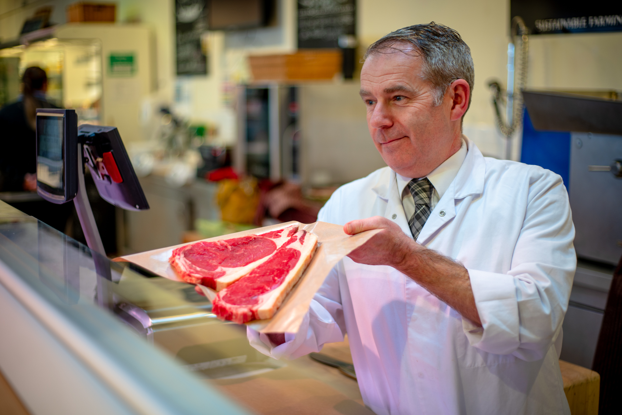 Steve James behind the Butchers counter in the Rhug Estate Farmshop.