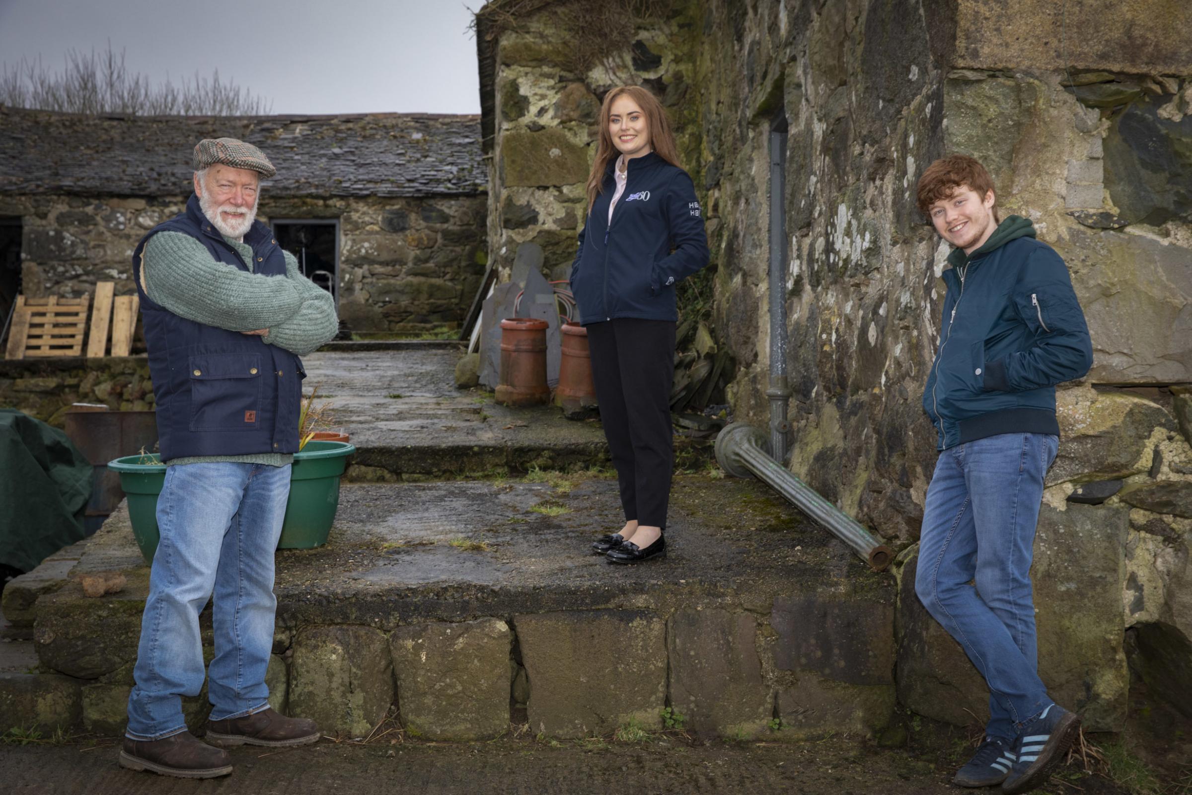 Lois Wynne from Ifor Williams Trailers with Dyfan Roberts (Gronw) and Gwion Morris Jones (Carbo). Photo: Mandy Jones