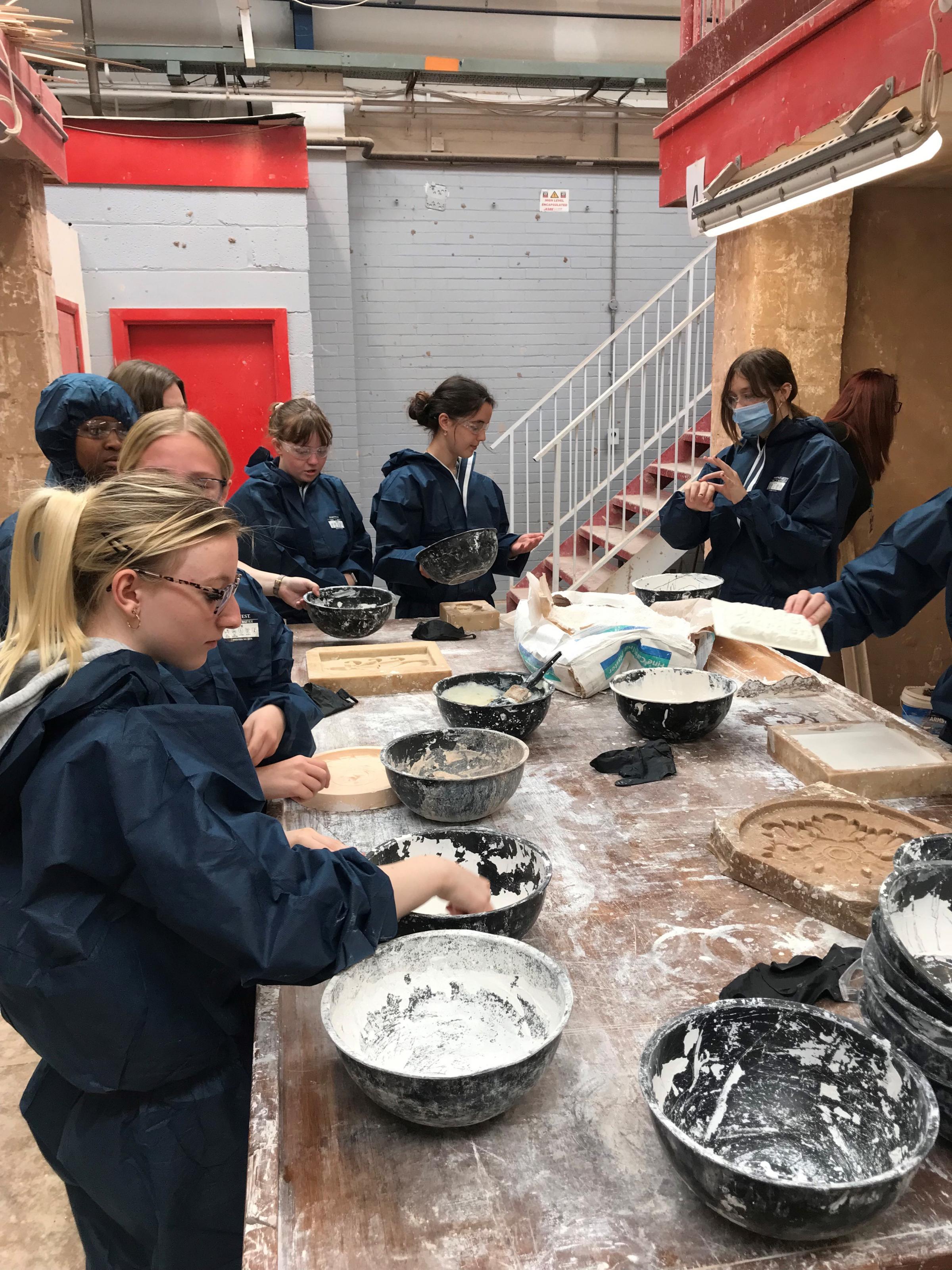 The girls learned how to make a ceiling rose using a mould in the painting and decorating workshop.