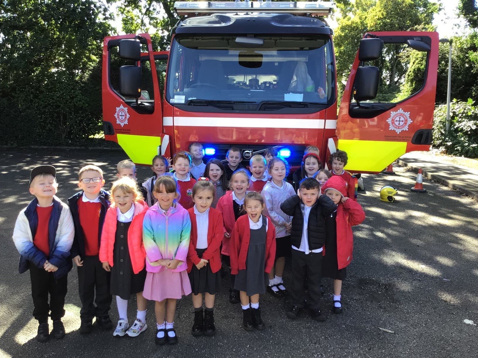 Firefighters from Mold Fire Station at Ysgol Mynydd Isa.