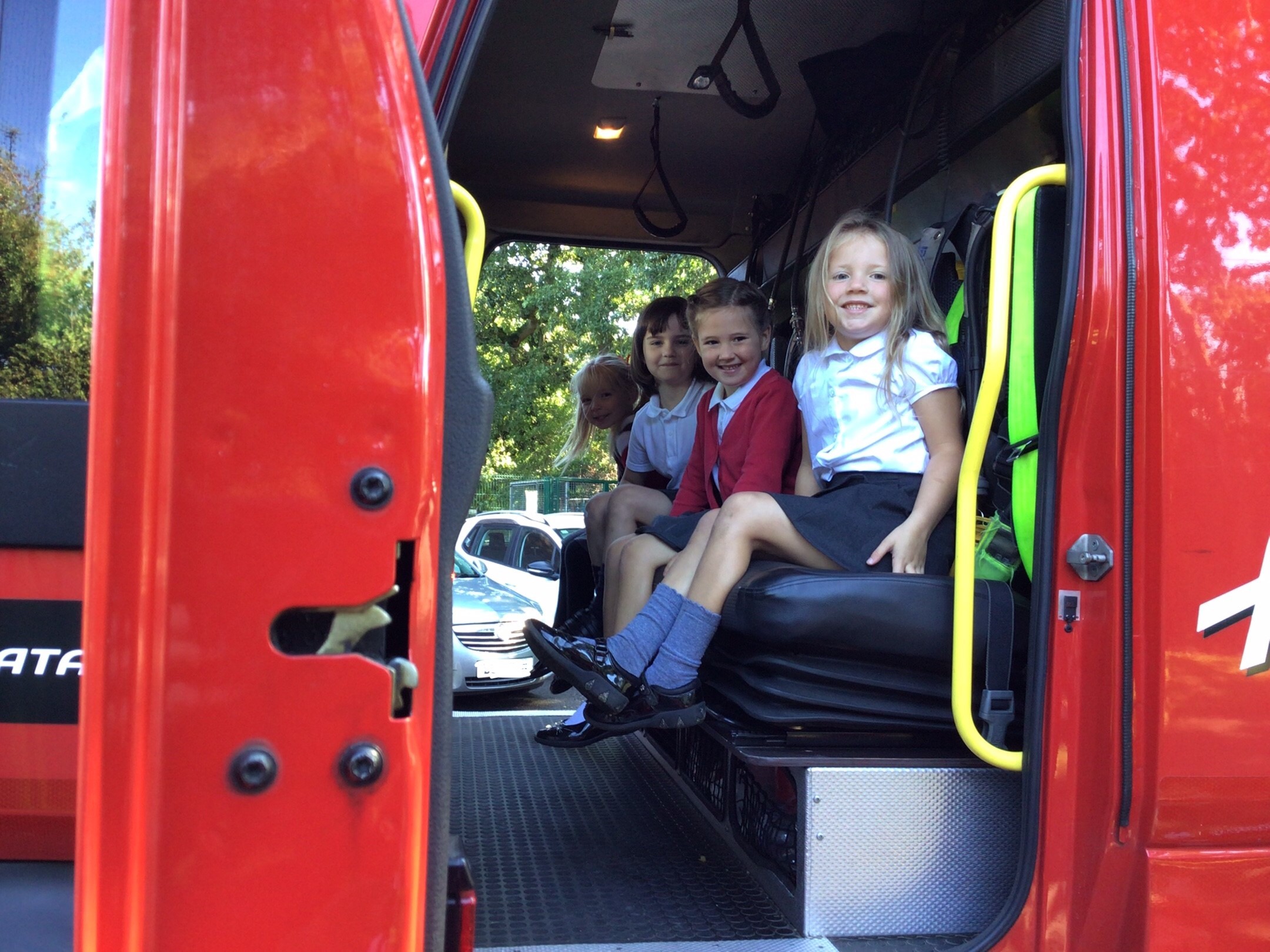 Firefighters from Mold Fire Station at Ysgol Mynydd Isa.