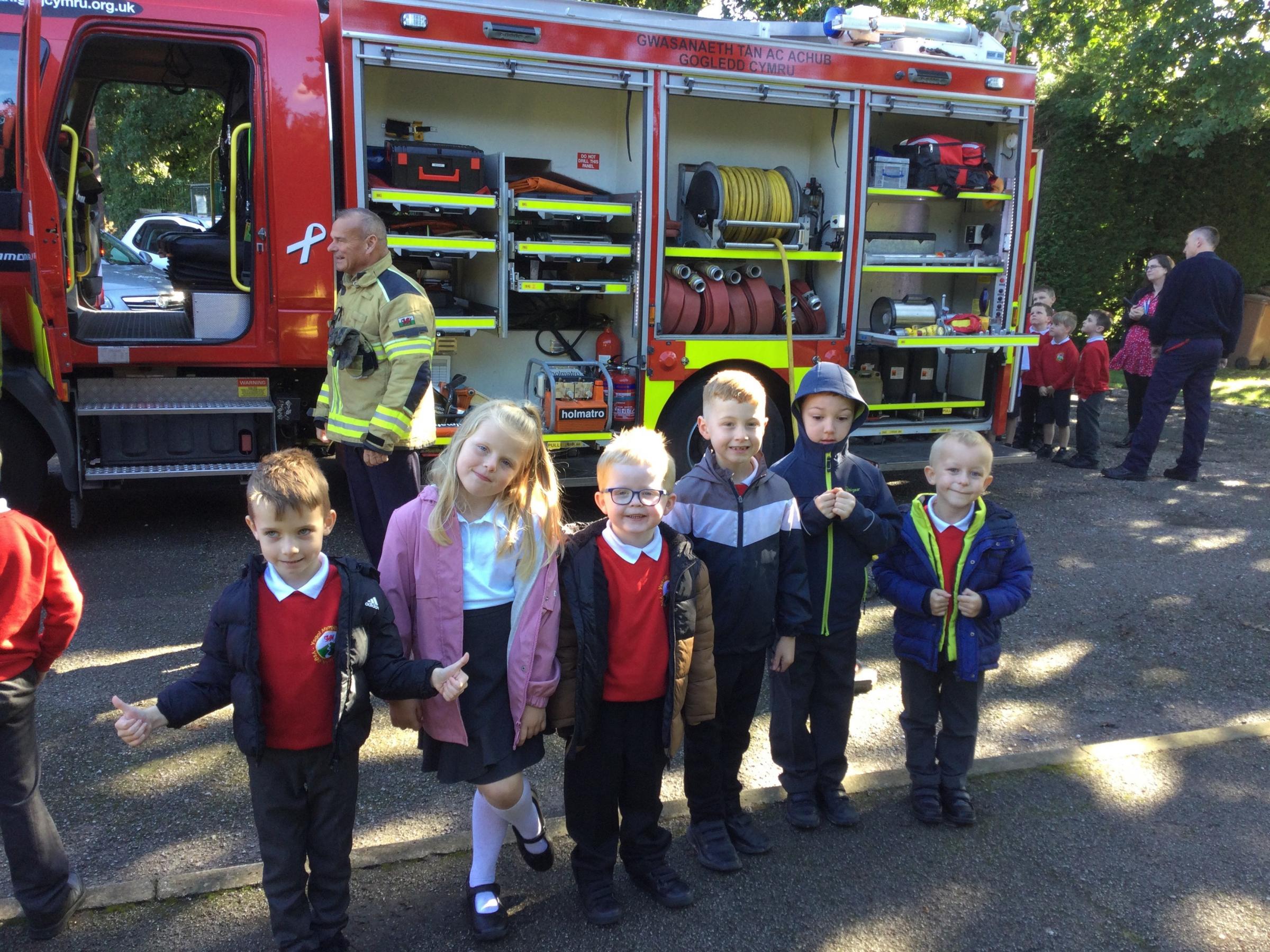 Firefighters from Mold Fire Station at Ysgol Mynydd Isa.