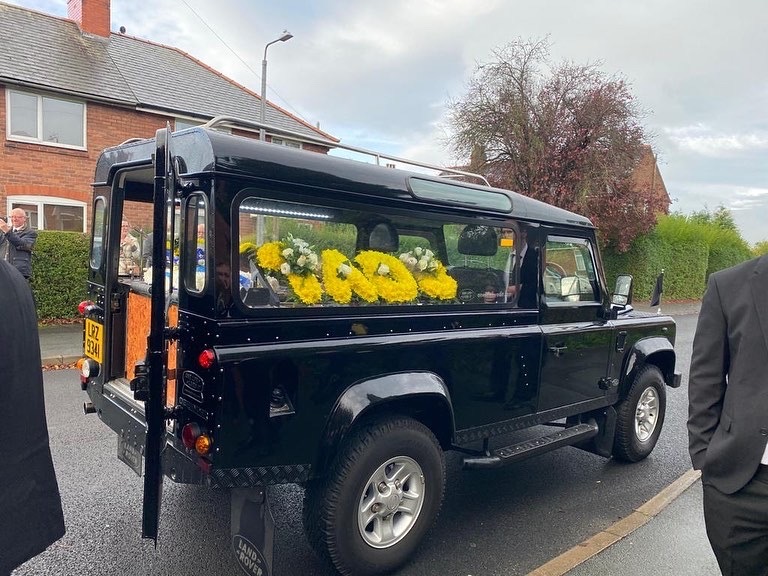 A hearse Landrover Defender carried Raymond Goodlet to Chester Crematorium