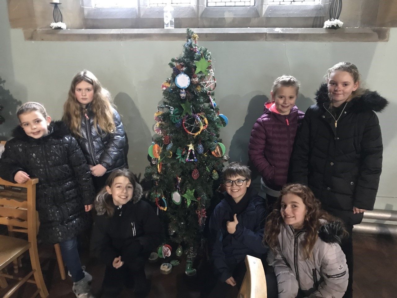 Pupils from Ysgol Penygelli, who used some of their own decorations at St Tudfils Church, in Coedpoeth.