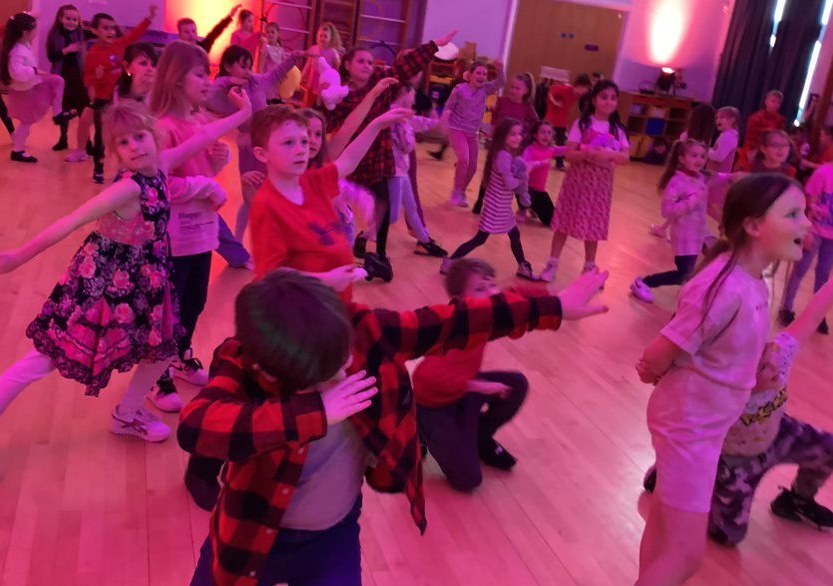 Ysgol Maes Y Felin pupils enjoying the fundraising Valentine’s disco.