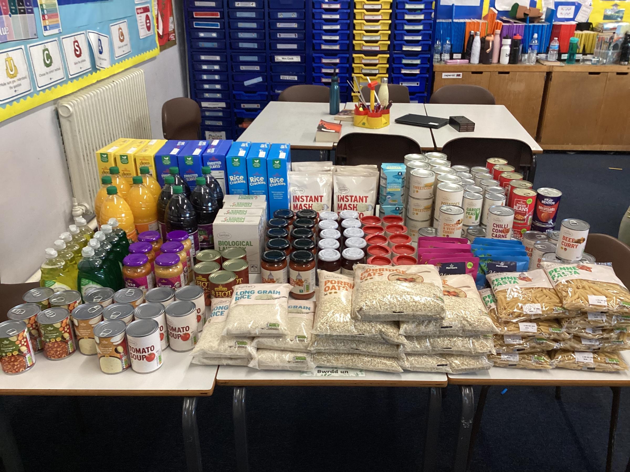 Food bought for community scheme Nanny Biscut with funds raised at Ysgol Bryn Devas cake sale.