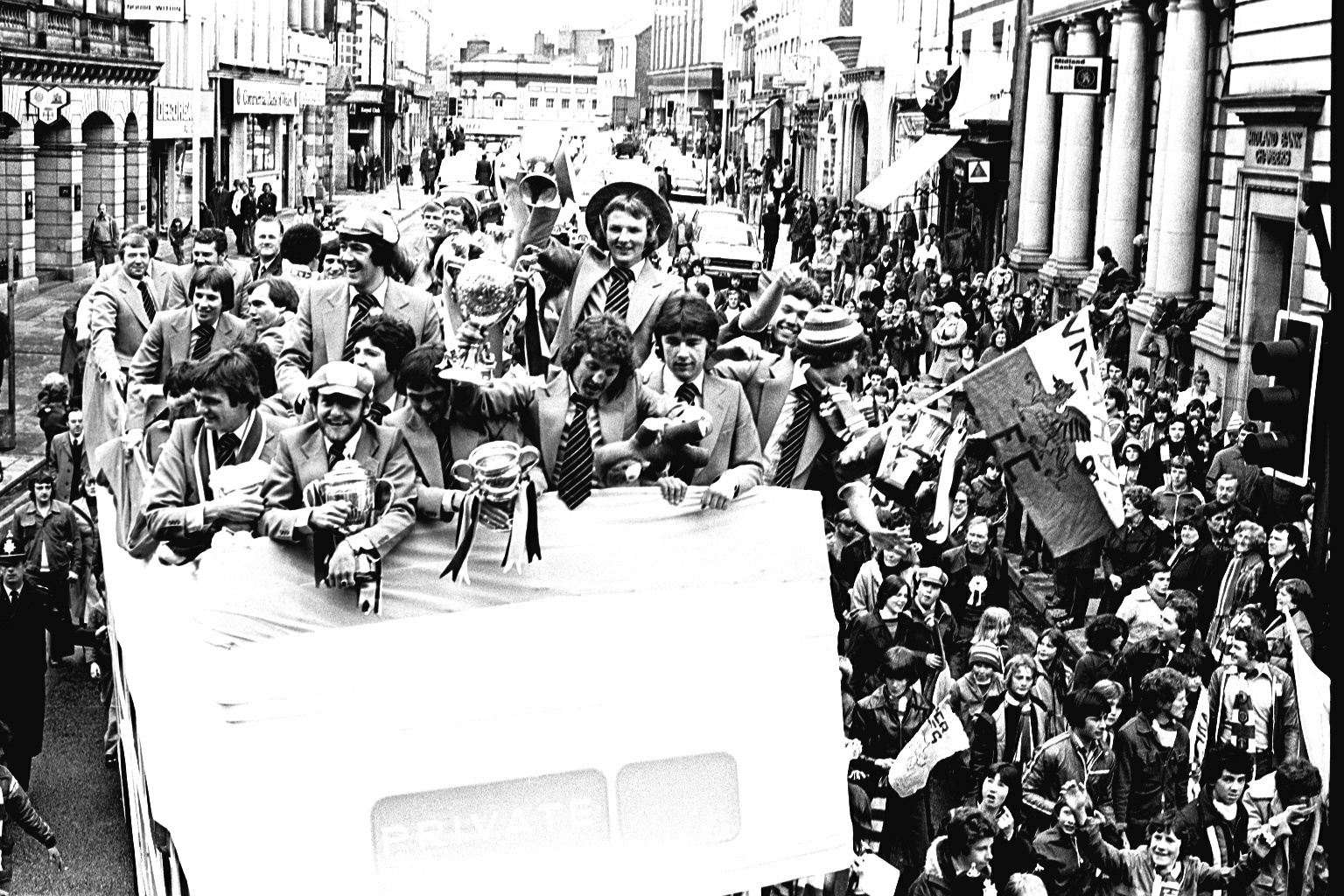 Wrexham players in an open topped bus parade, 1978