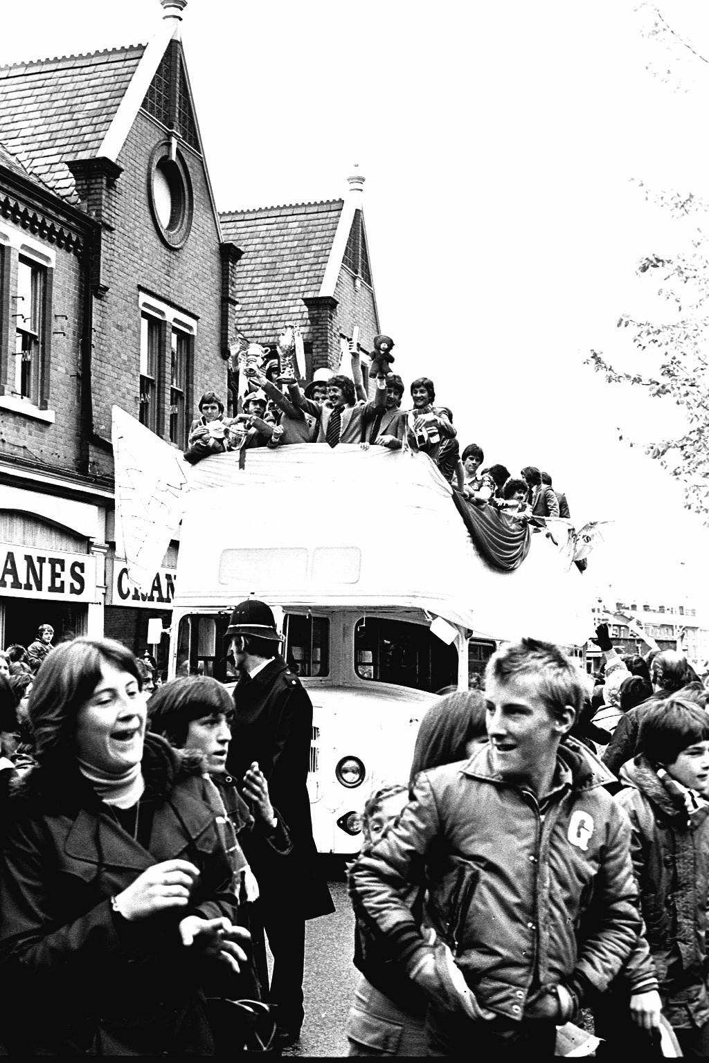 Wrexham players in an open topped bus parade, 1978