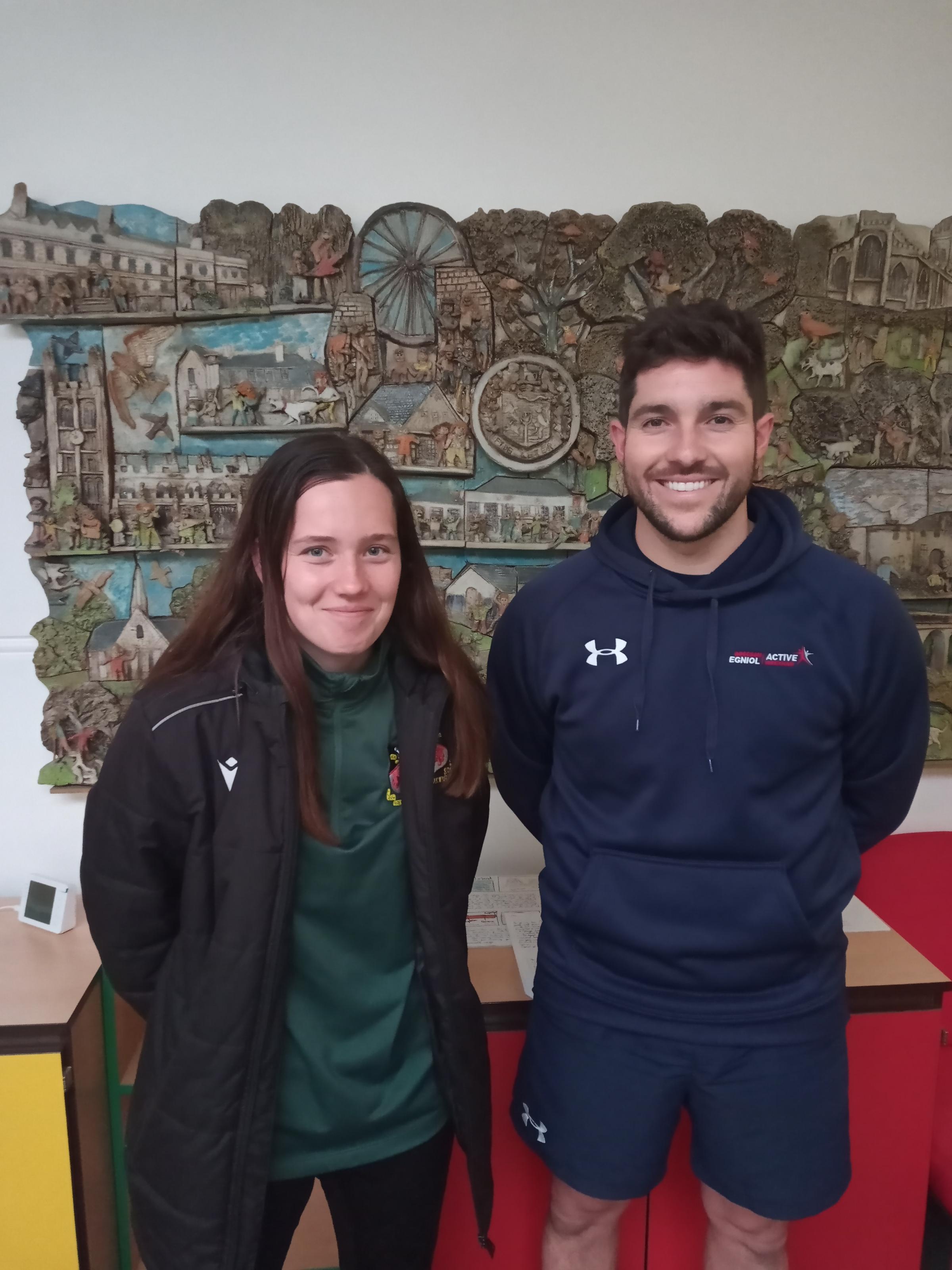 Wrexham AFC Womens player Kim Dutton and former Wrexham AFC captain Robbie Evans.