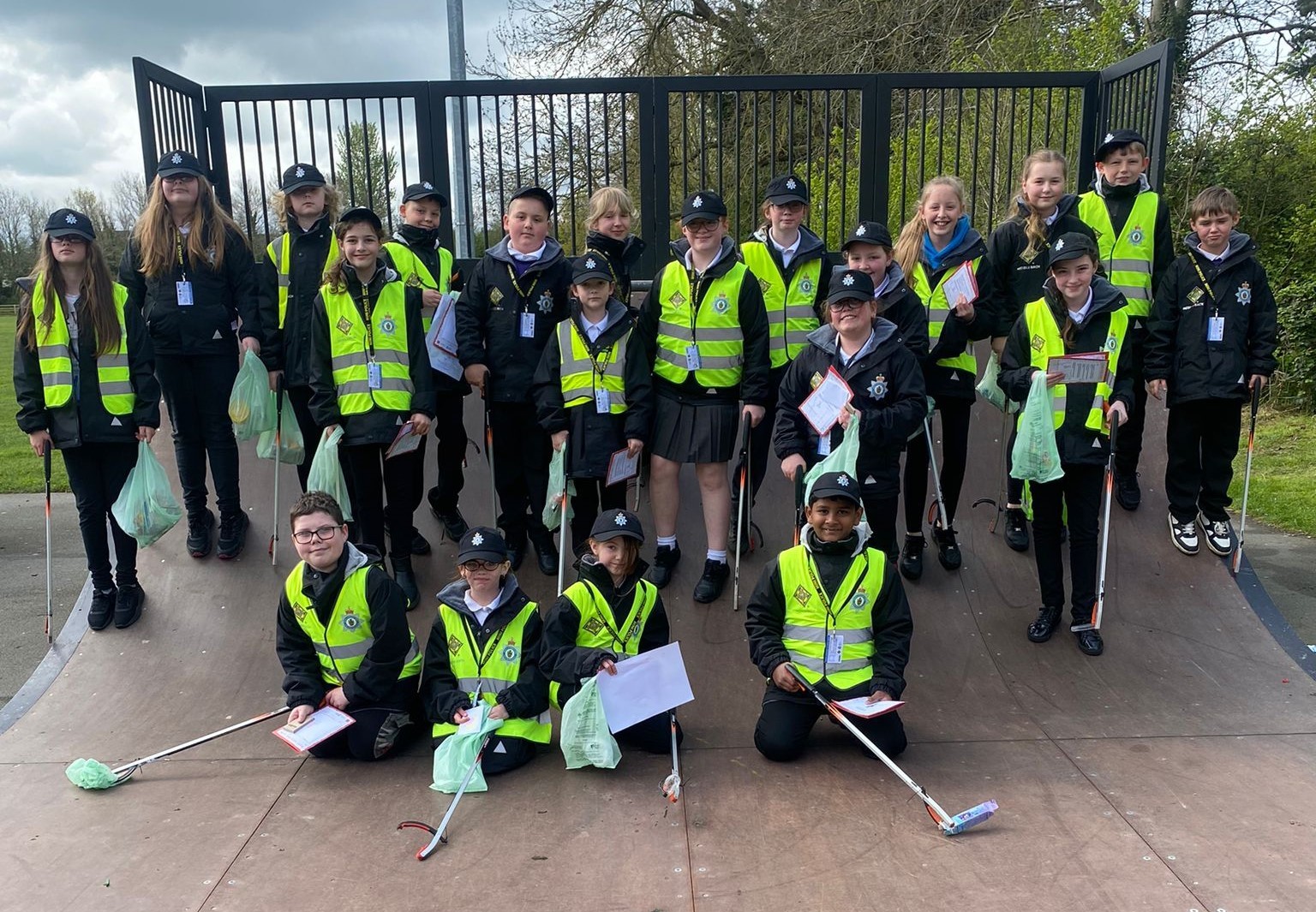 Litter picking from Westwood Primarys mini police, with PCSO Rachel Duddle.