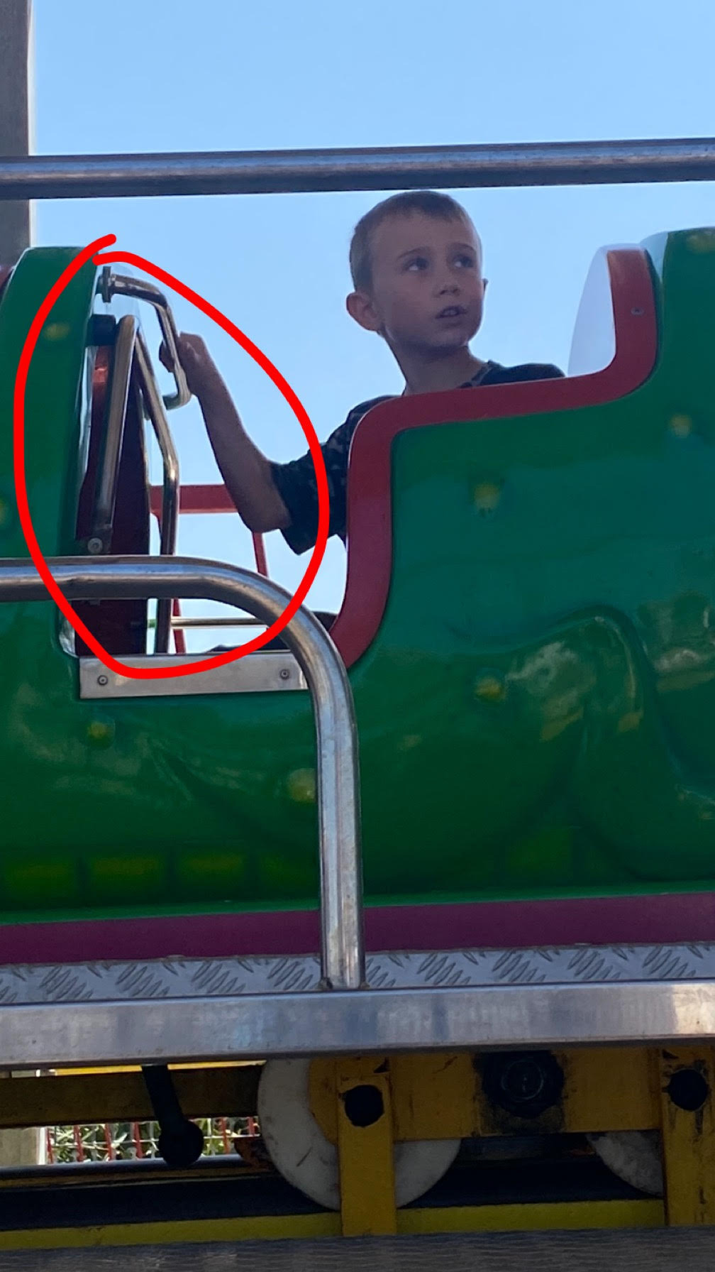 James on The Nessie rollercoaster without the safety bar in place. 