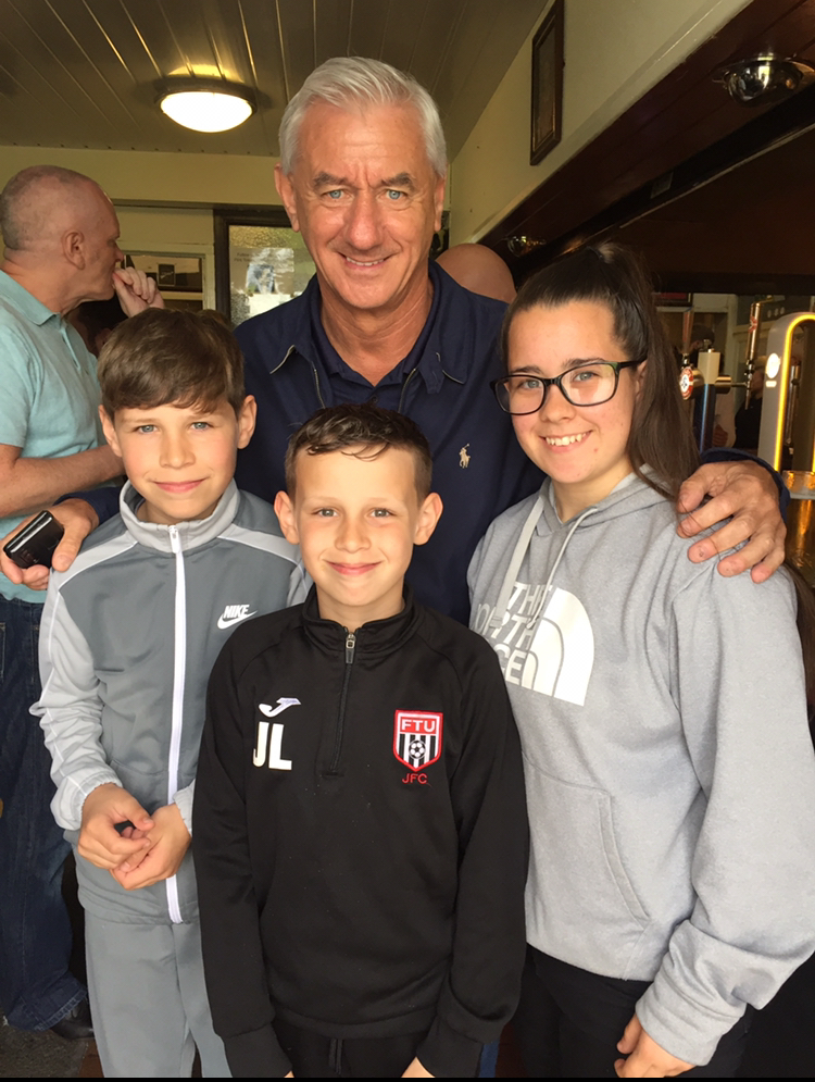 Samantha Anne Jones, from Flint: Ian Rush, my daughter Bethany and my boys Joshua and Jake at Flint Town United Social Club for the players presentation.