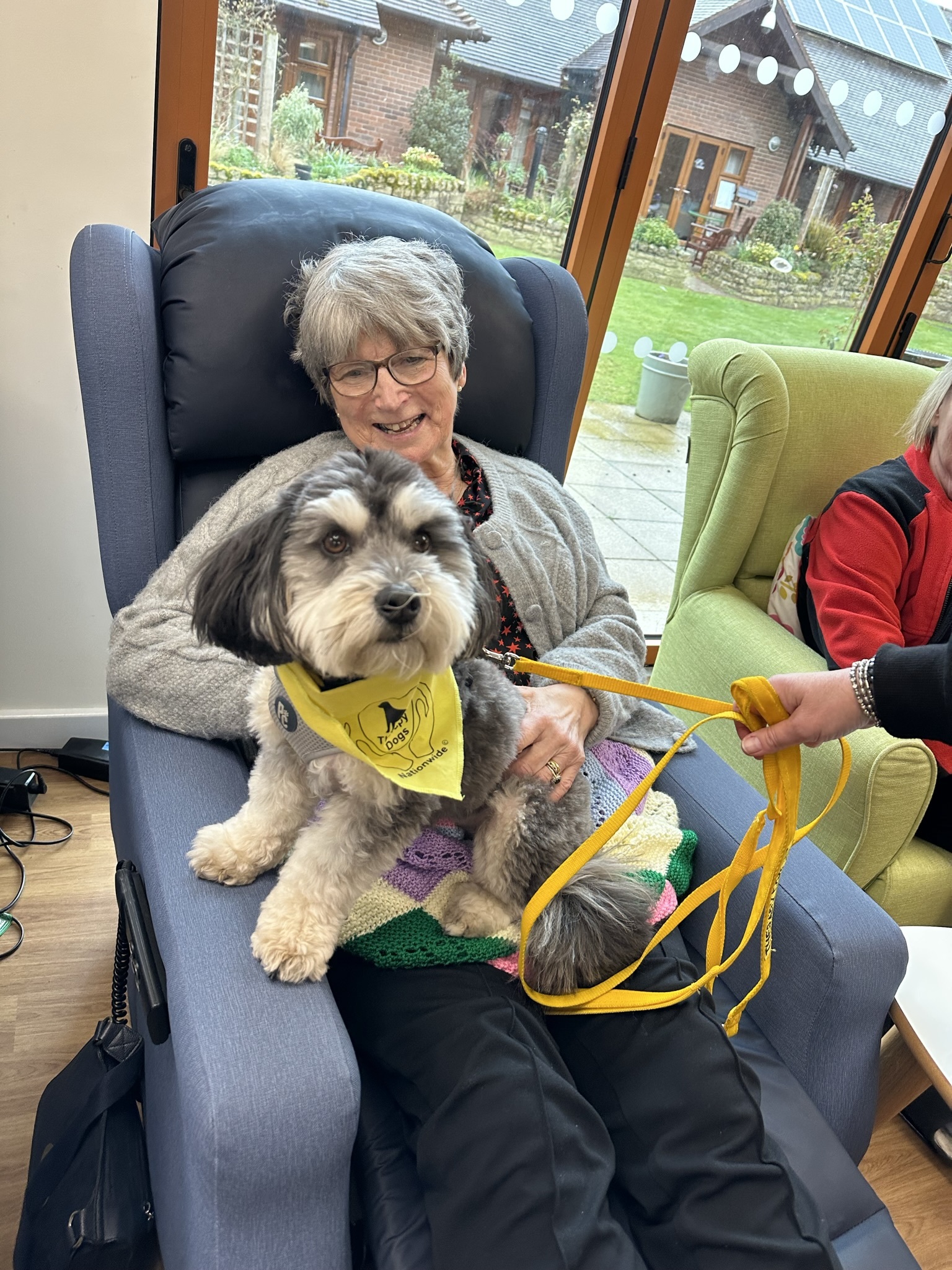 Beatrice Williams with therapy dog Barney.