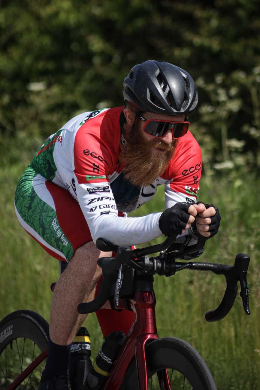 Sean Conway cycling on day 51 of his 102-day triathlon record breaking attempt. Photo: Justin Fletcher Photography