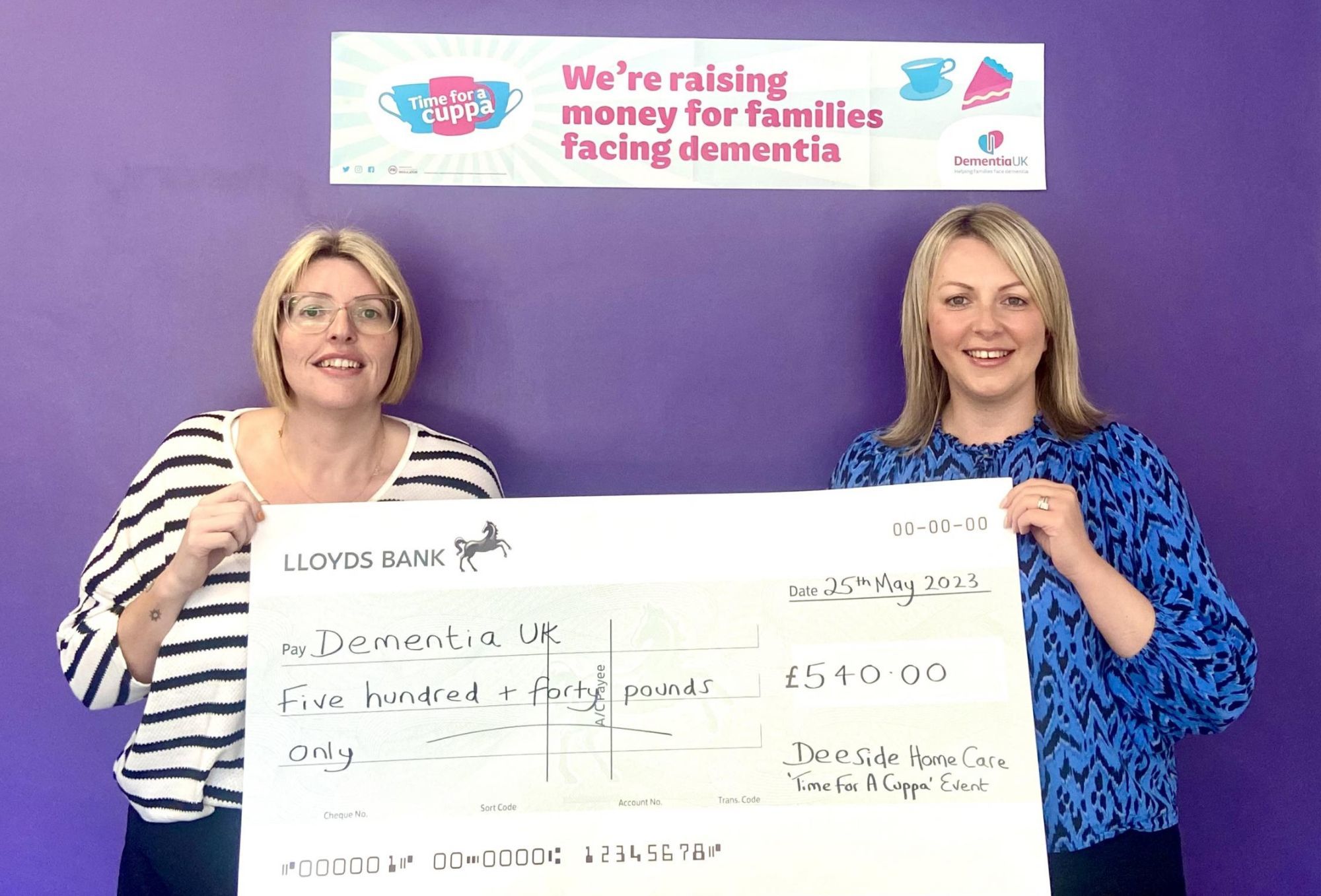 Deeside Home Care team leader Jenny Evans and owner/manager Natalie Marshall, with the cheque for funds raised.