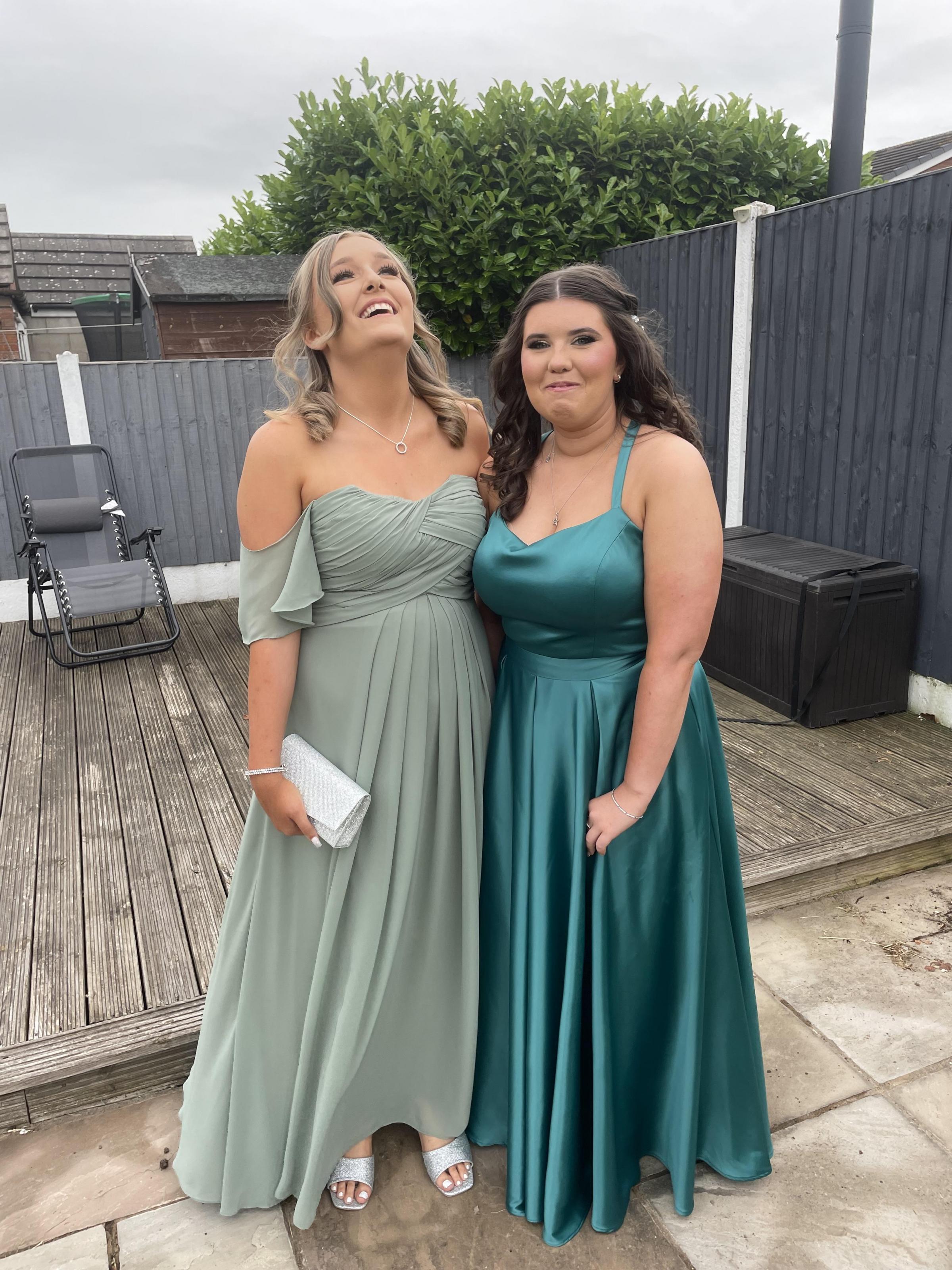 Caitlin Higgins and Ellie Diamond before their limo arrived to the Ysgol Bryn Alyn prom.