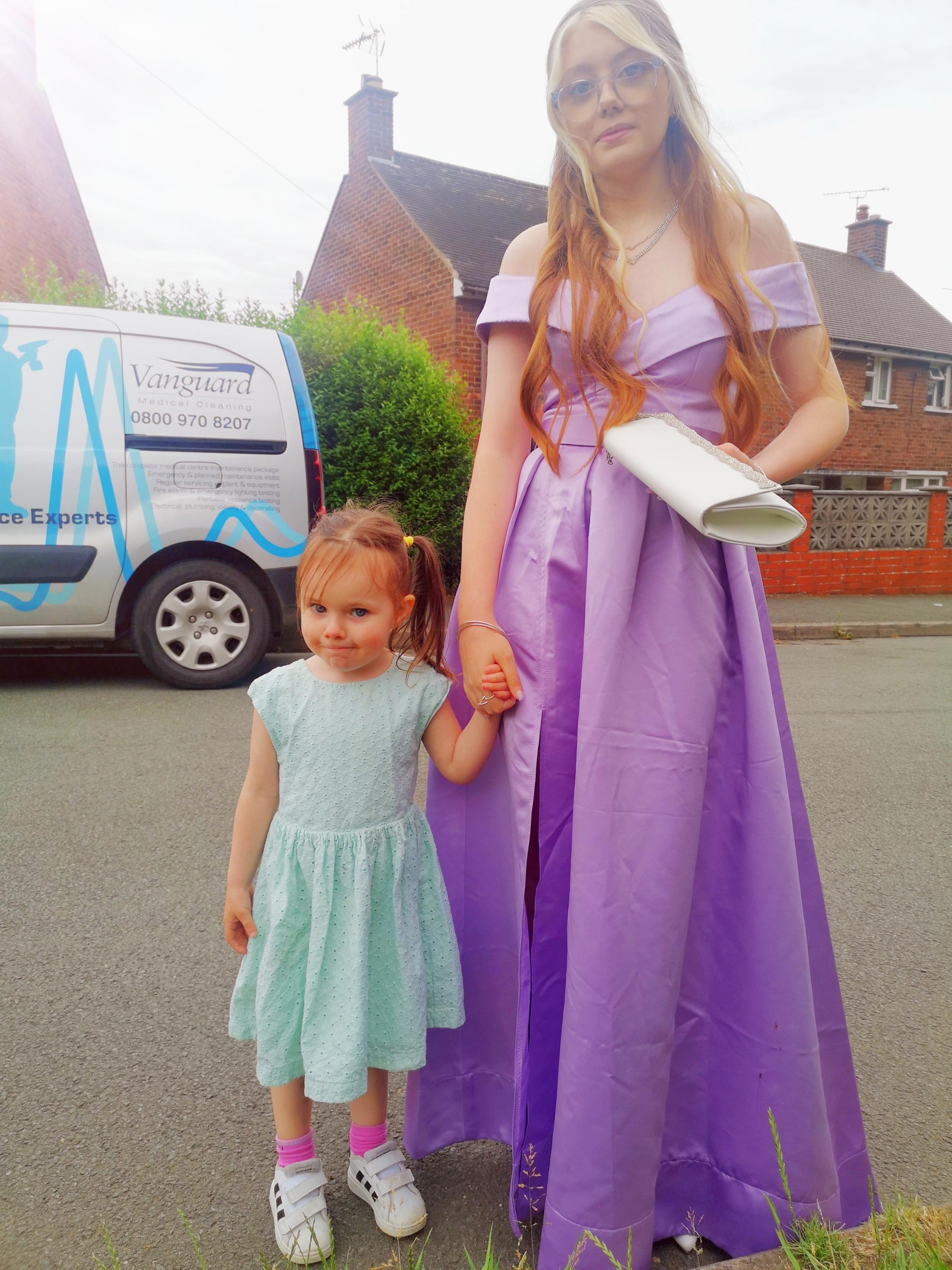 Mia Higgins and niece Nevaeh Rose, waiting her lift to the Ysgol Bryn Alyn prom.