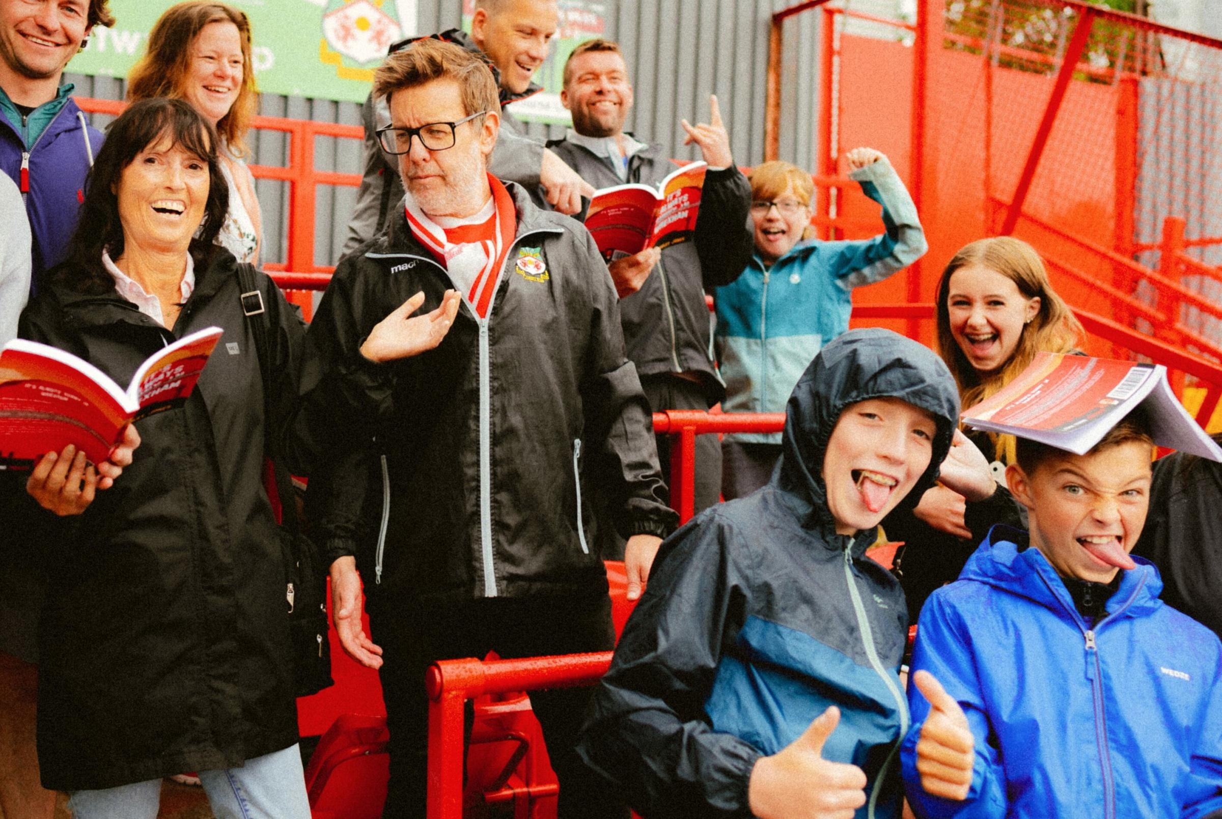 Andrew Foley Jones with fellow Reds fans.