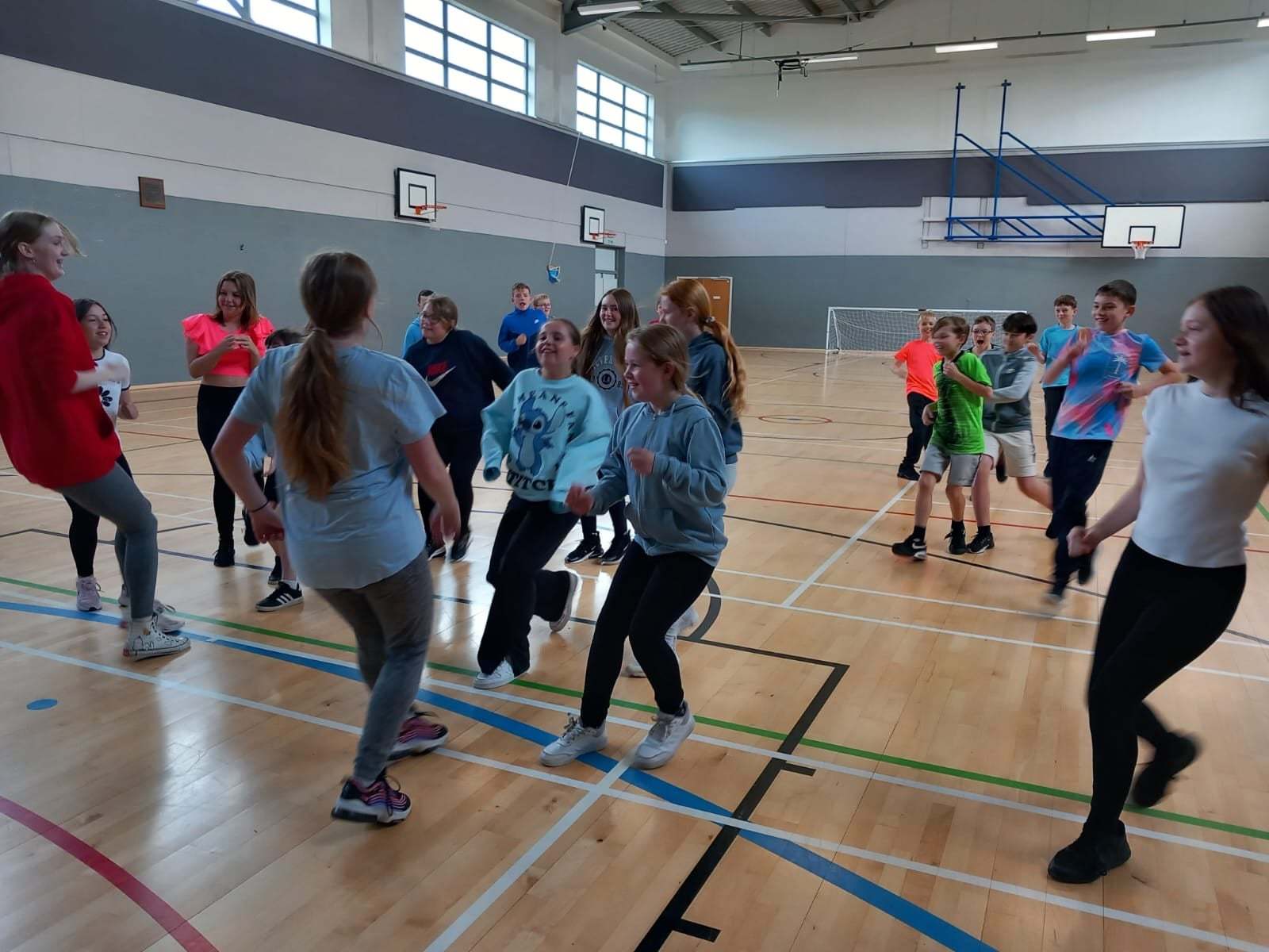 Children keep active during an indoor sports session.