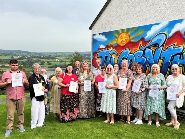 Some of the North Wales Hope House volunteers with their certificates. 