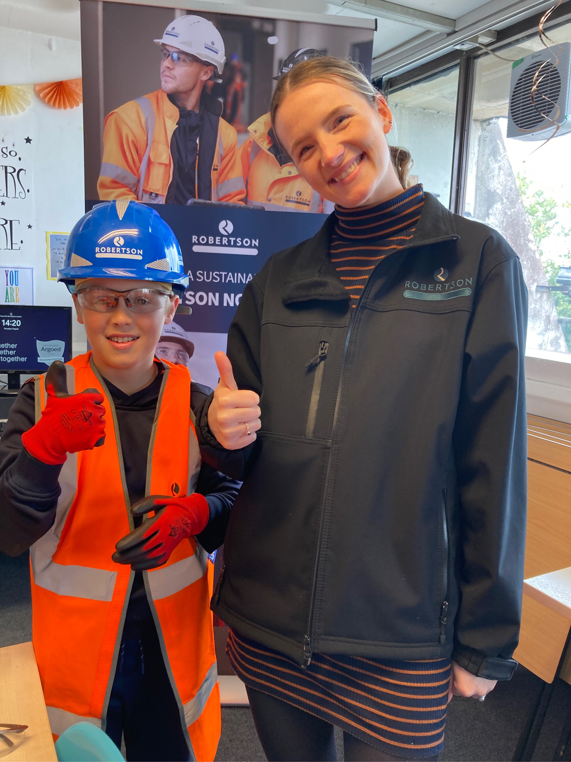 Shannon Dawe with Evan Cooper, Year 7, who tries out the safety kit.