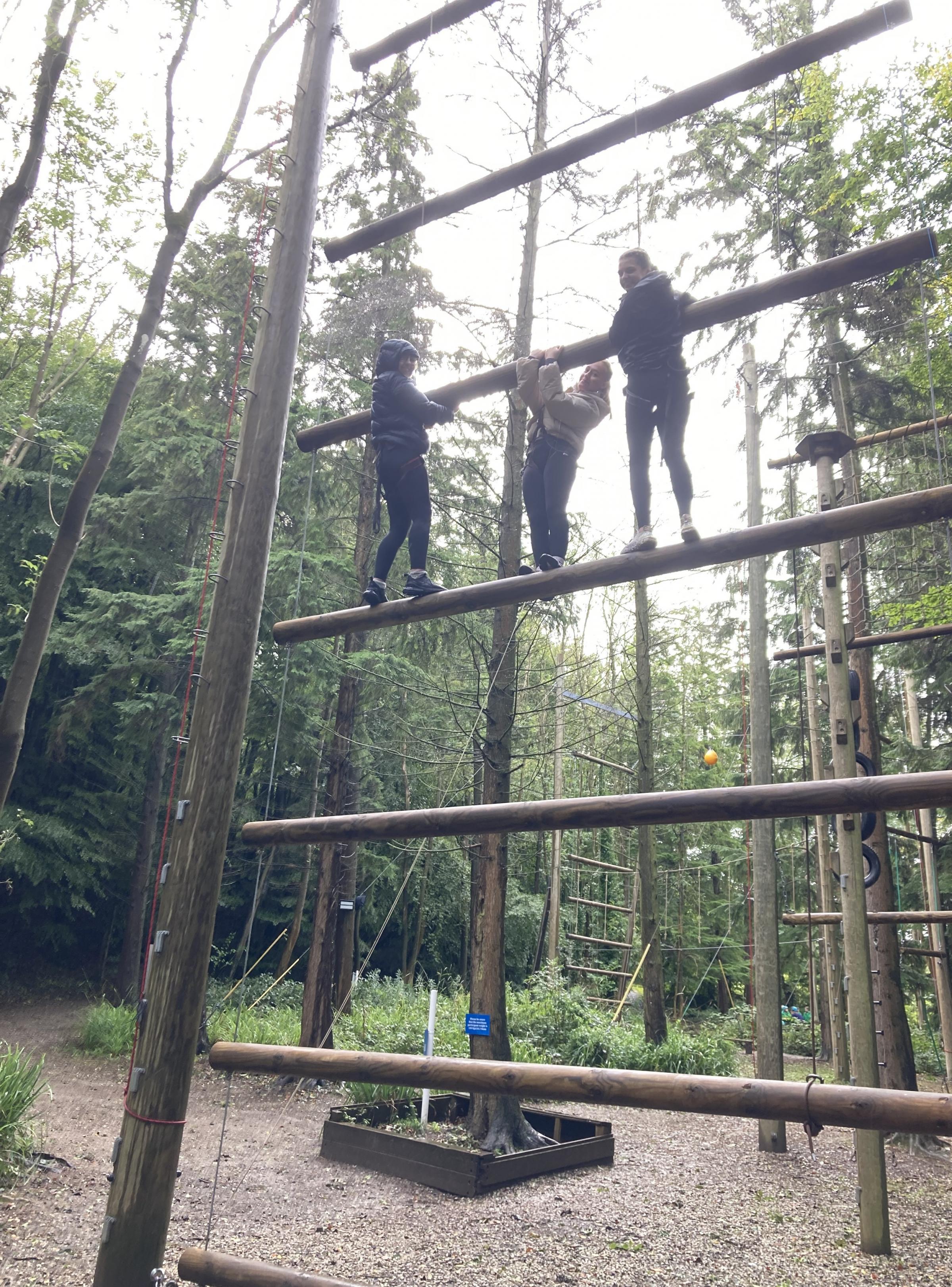 Three students have to work together to plan their ascent of Jacobs Ladder.