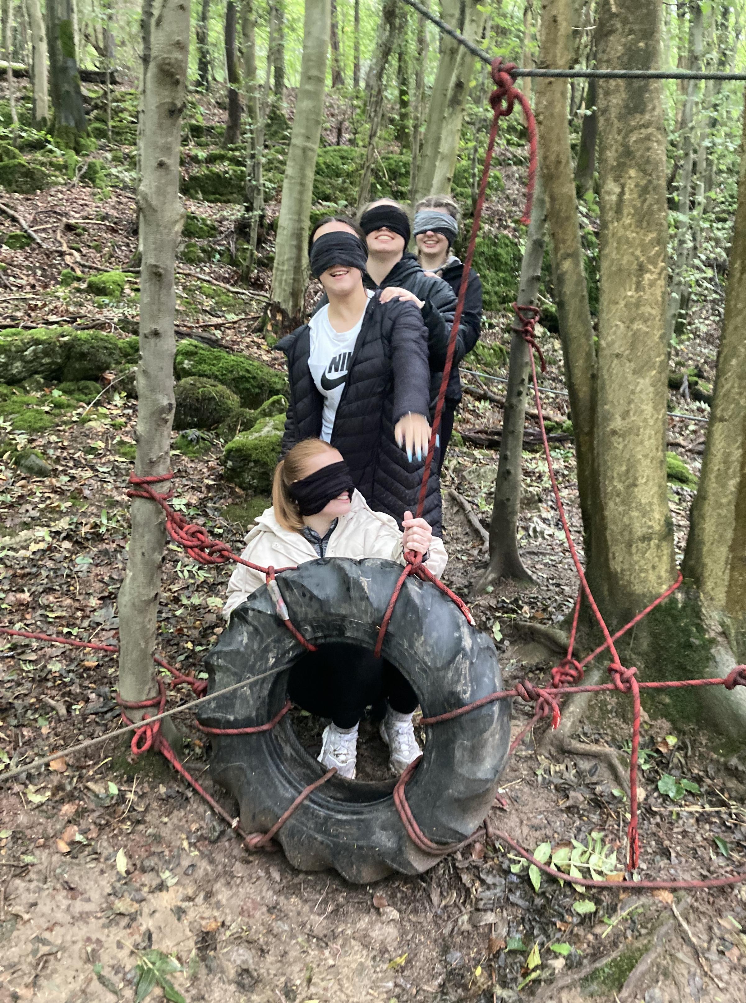 Students navigate the nightline obstacle course.