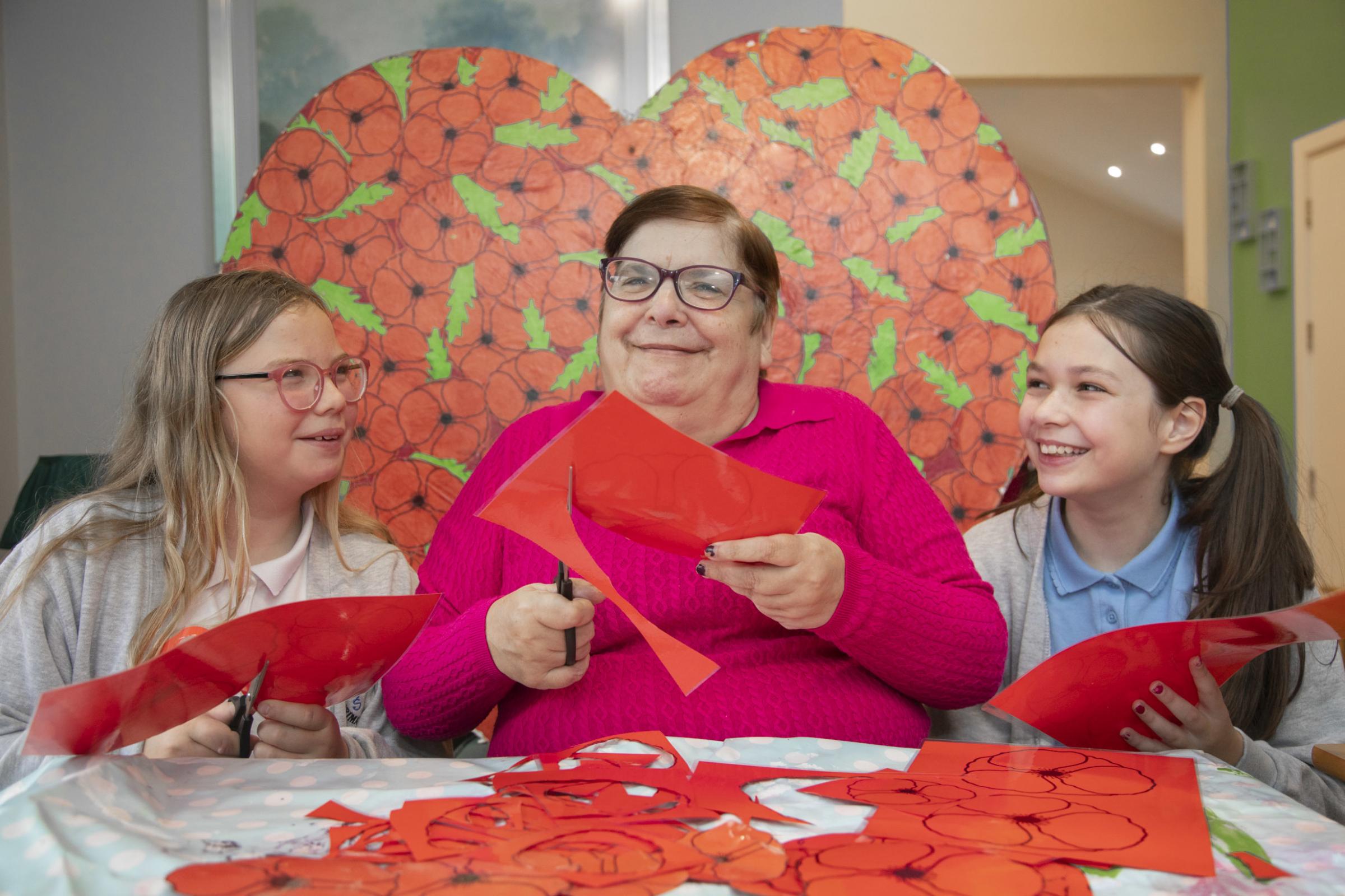 Pendine Parks Bryn Bella resident Tracey Wilde with Gwersyllt pupils Ellie Mae and Naomi. Picture: Mandy Jones