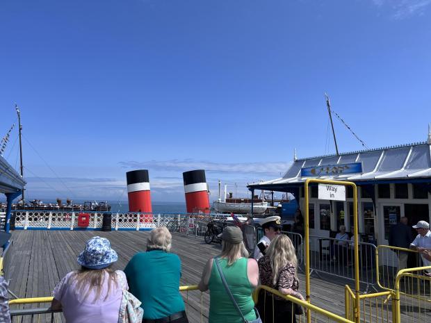 Crowds gathered on Llandudno Pier to see the Waverley set off on her journey. (Image: Suzanne Kendrick)