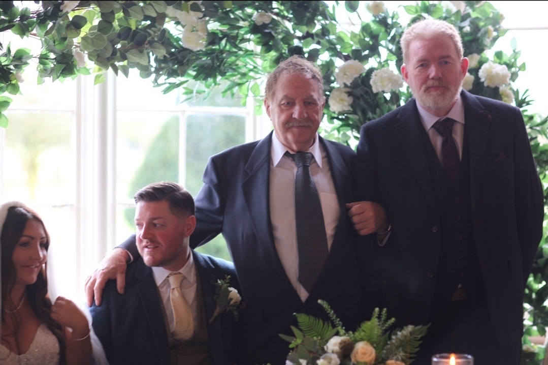 Rebecca, Gareth, brides grandad Brian and dad Rob.