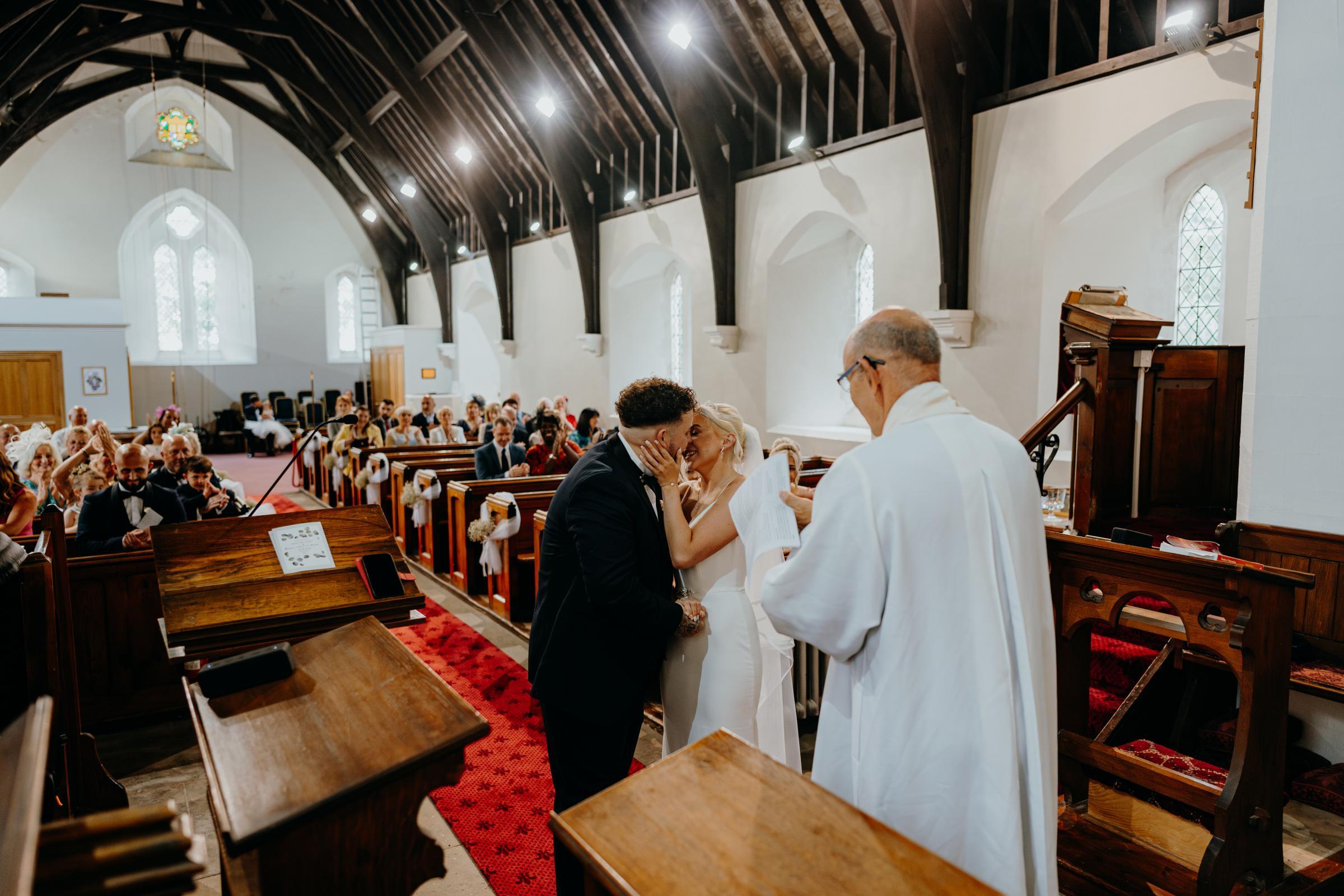 Jamie and Becca Inskips first kiss as a married couple.