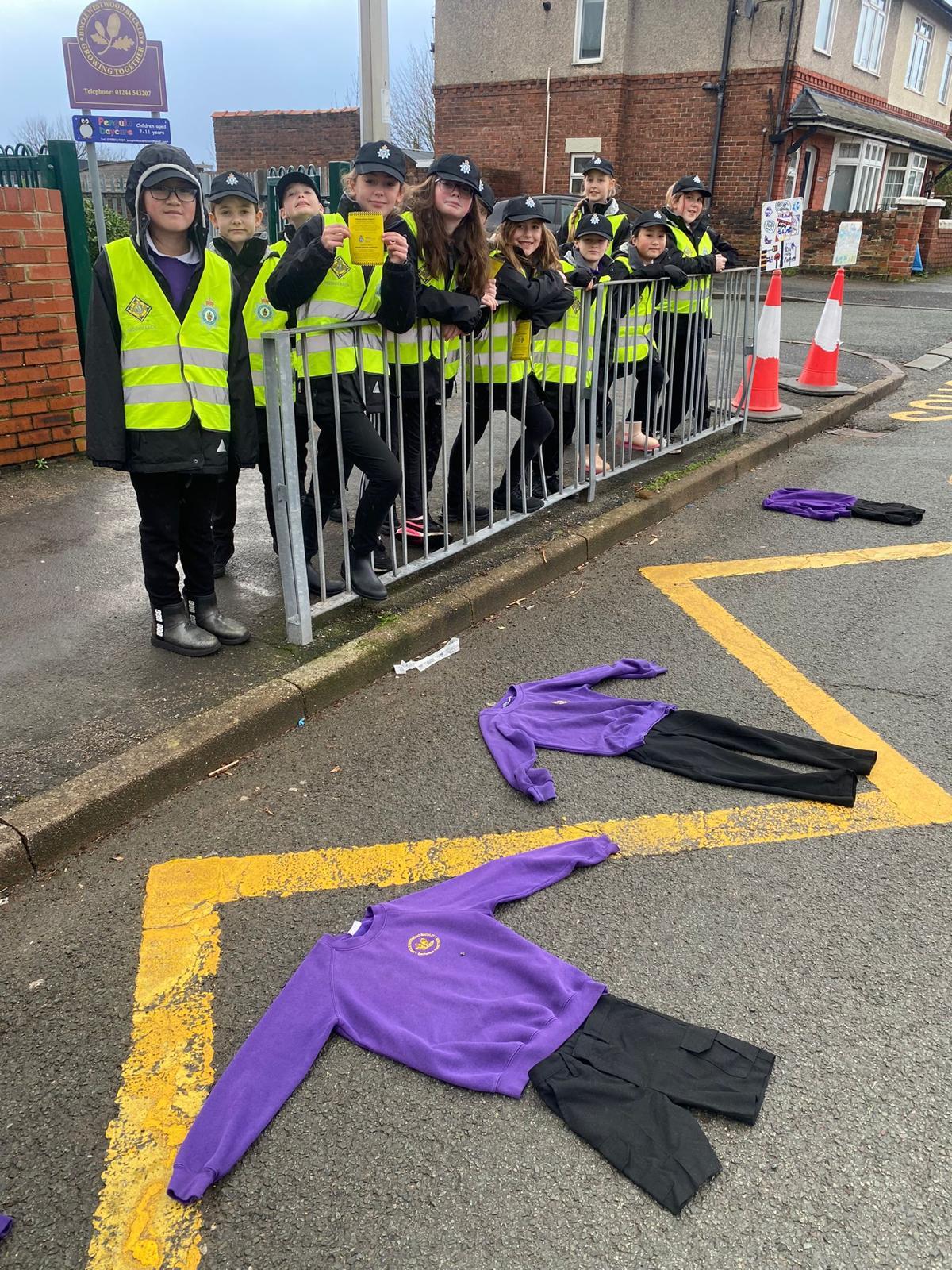 Using school uniforms to highlight parking issues at Westwood Primary School.