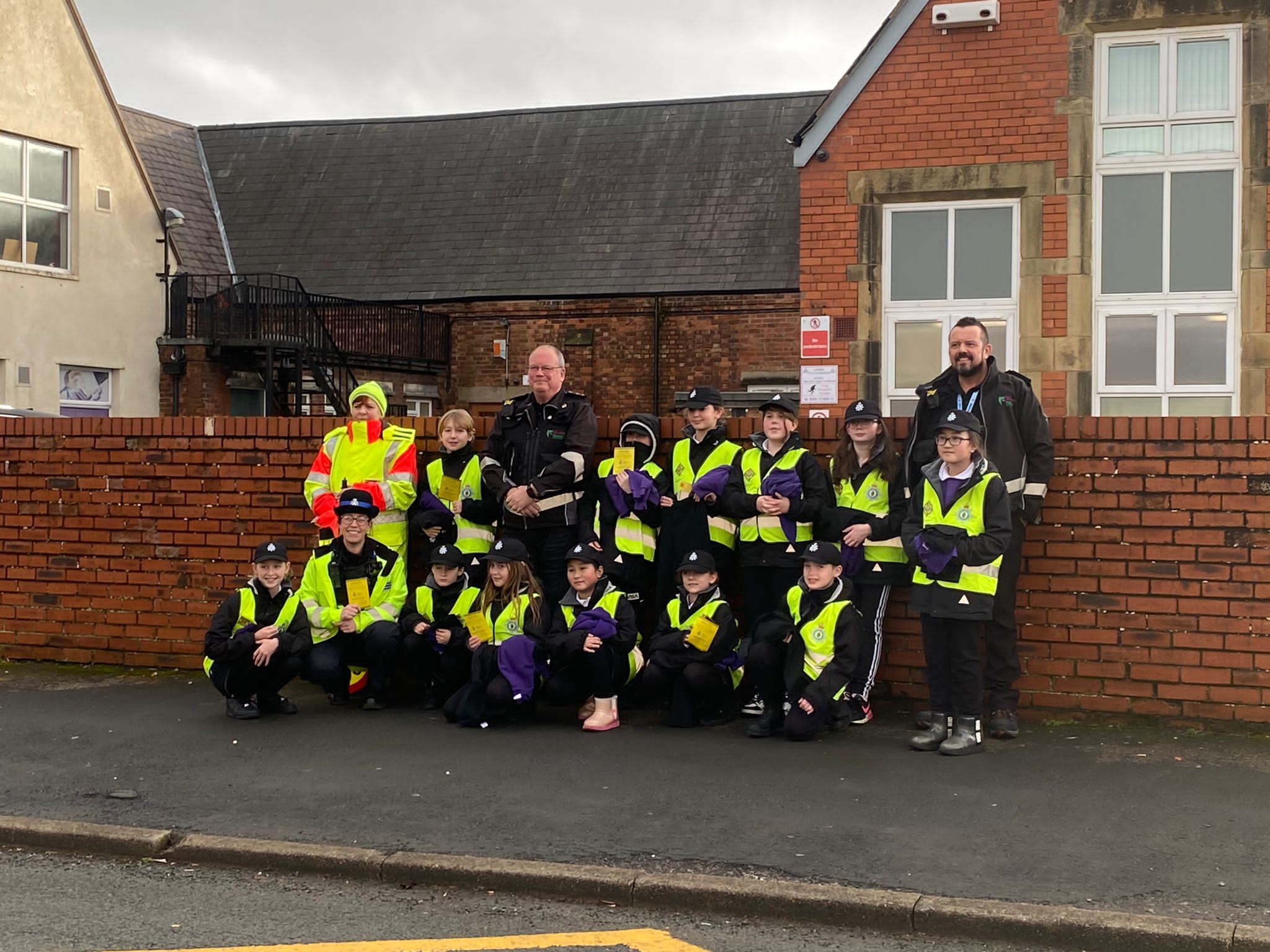 Traffic wardens and PCSO Rachael Duddle with Westwood Mini Police.