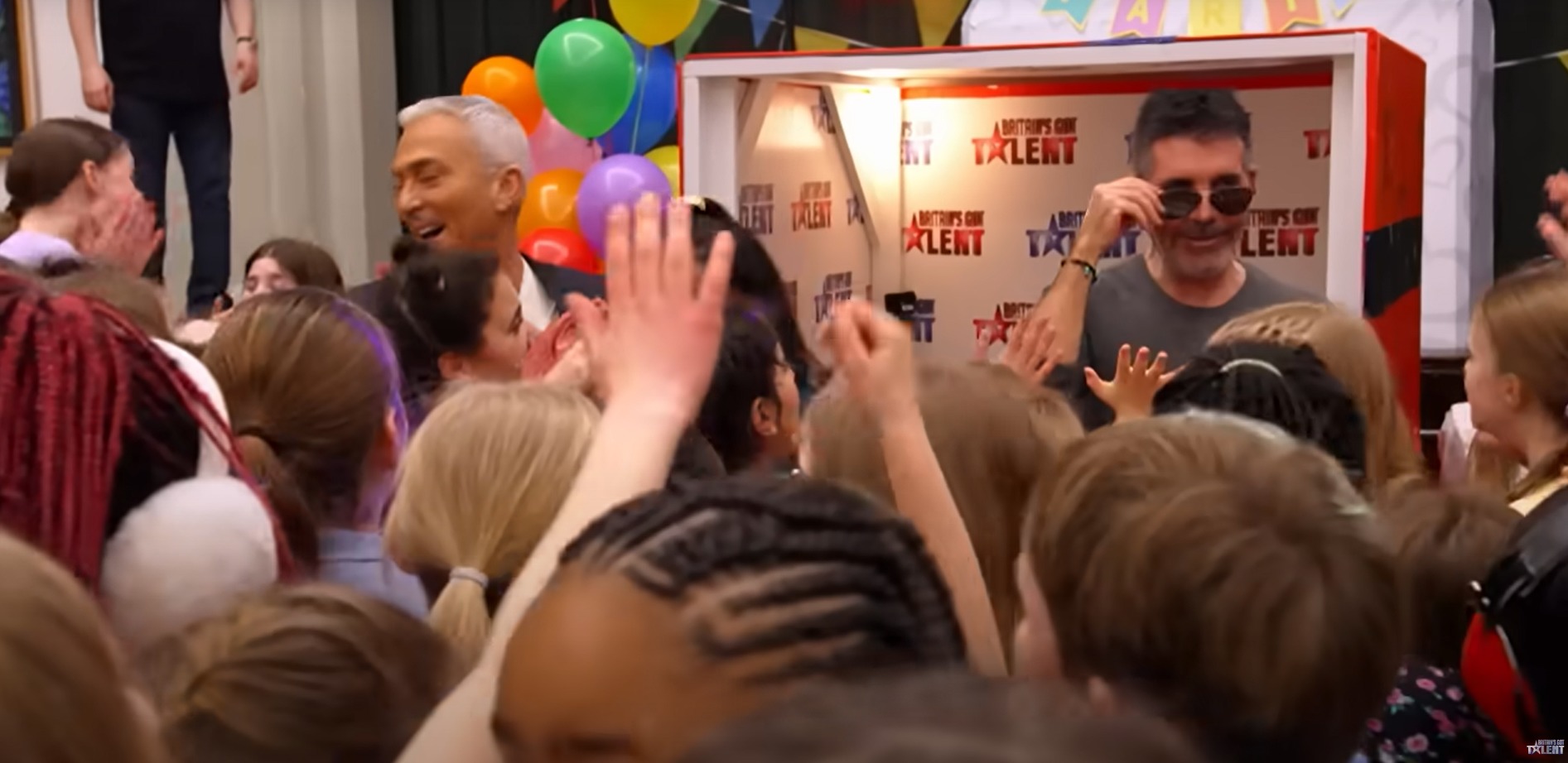 BGT judges Simon Cowell and Bruno Tonioli surprised Amasing children by popping out of a giant box at their end-of-term party. Picture: ITV/Britains Got Talent.