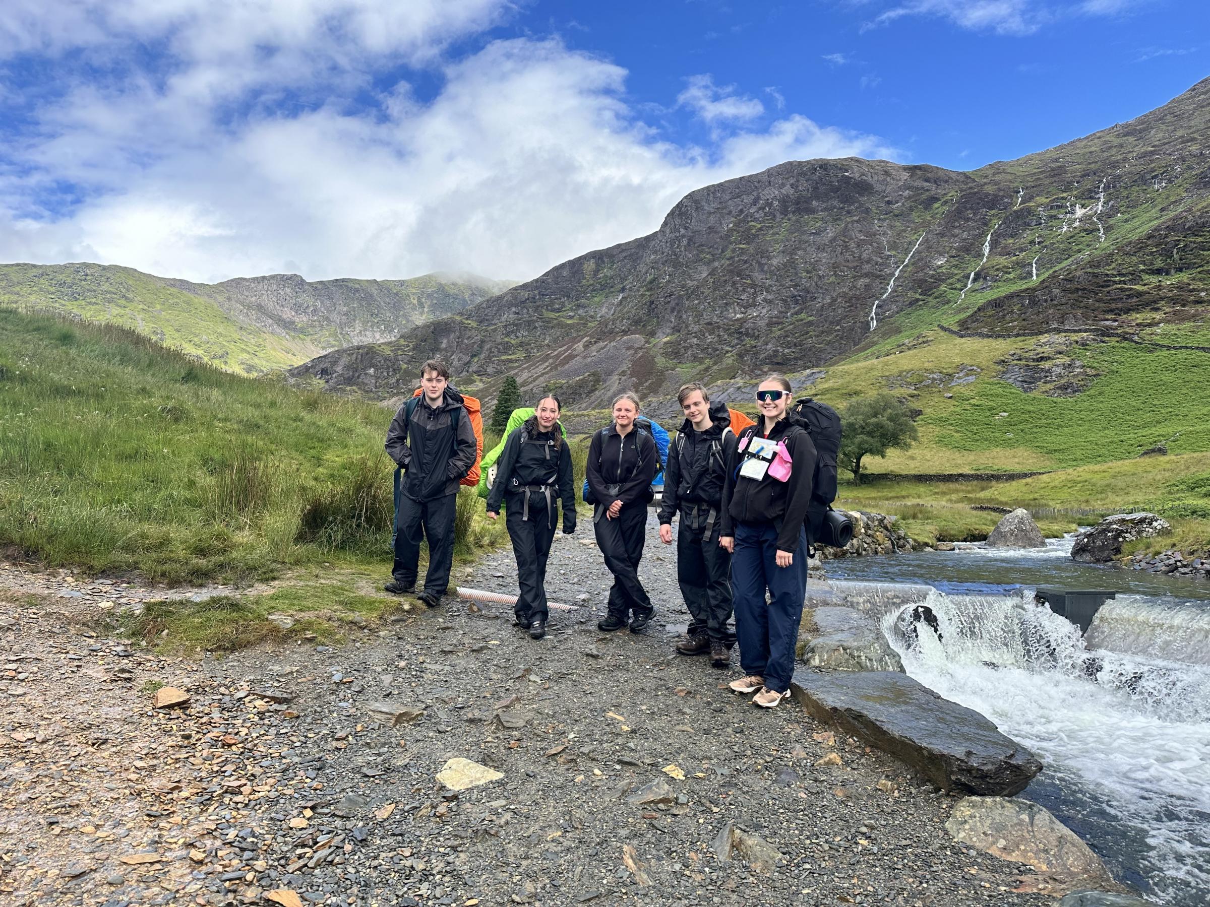 The students take a break to admire the stunning scenery. 