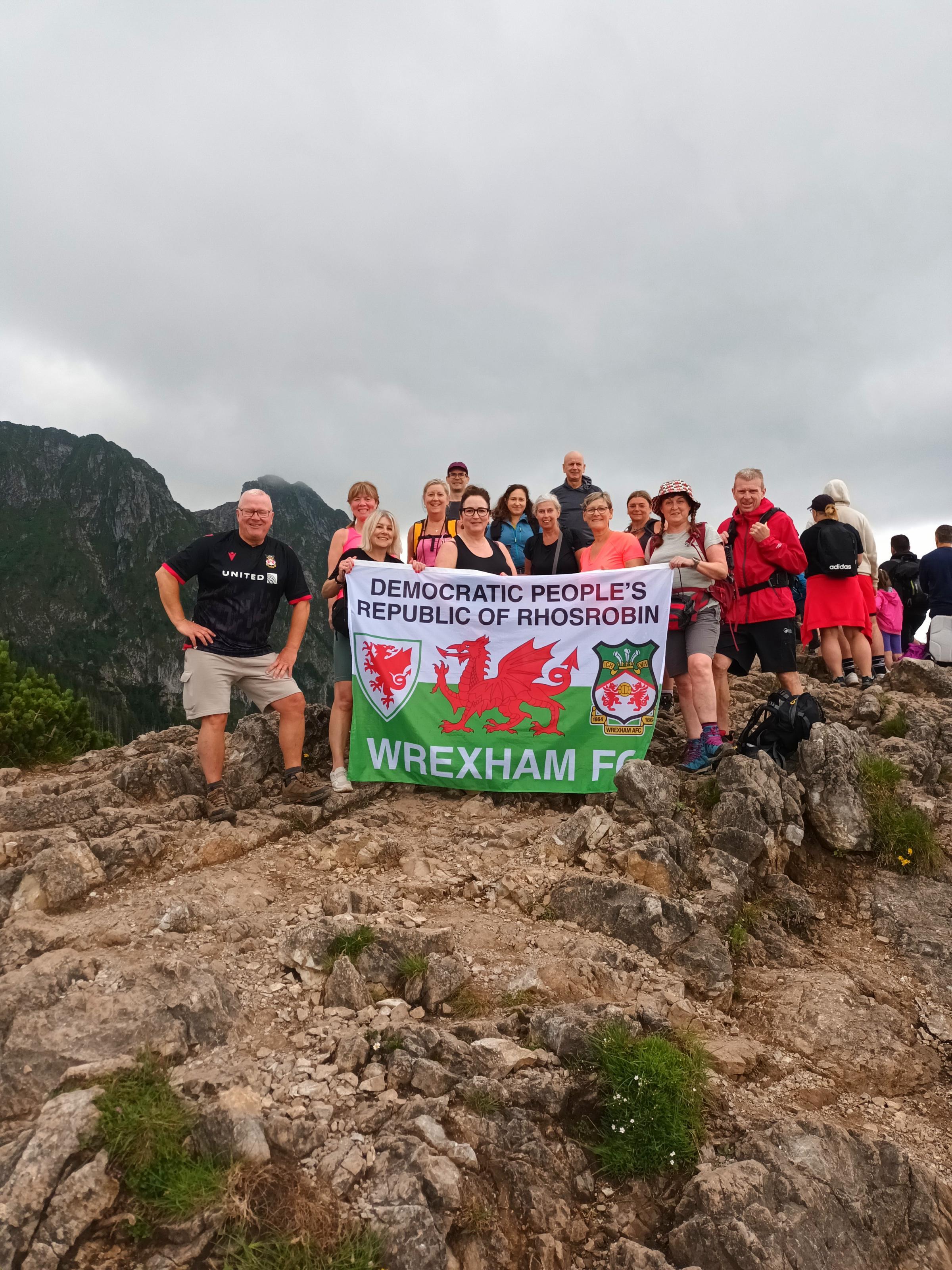 Max Wiecko, from Rhosrobin, Wrexham, in Sarnia Skala mountain, Tatra Mountains, Zakopane, Poland, with, Vickie, Karen, Anne, Mike,Andrea, Yana, Heulwen, Brenda, Ali, Gaynor, Lynette and Hammy.