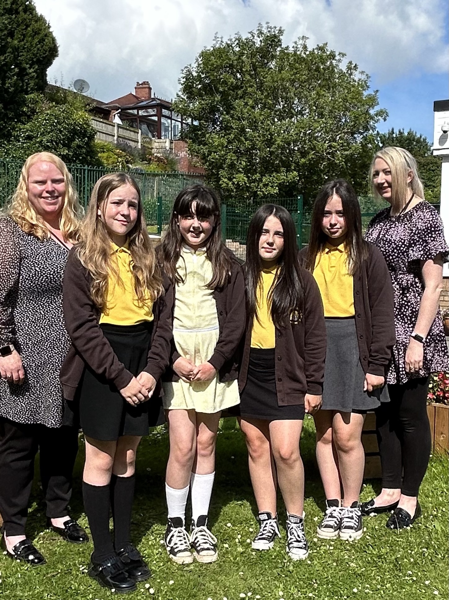 Headteacher Sian Jones-Evans, pupils Ella, Annabelle, Lottie, Isobel and acting deputy headteacher Danielle Rainford.