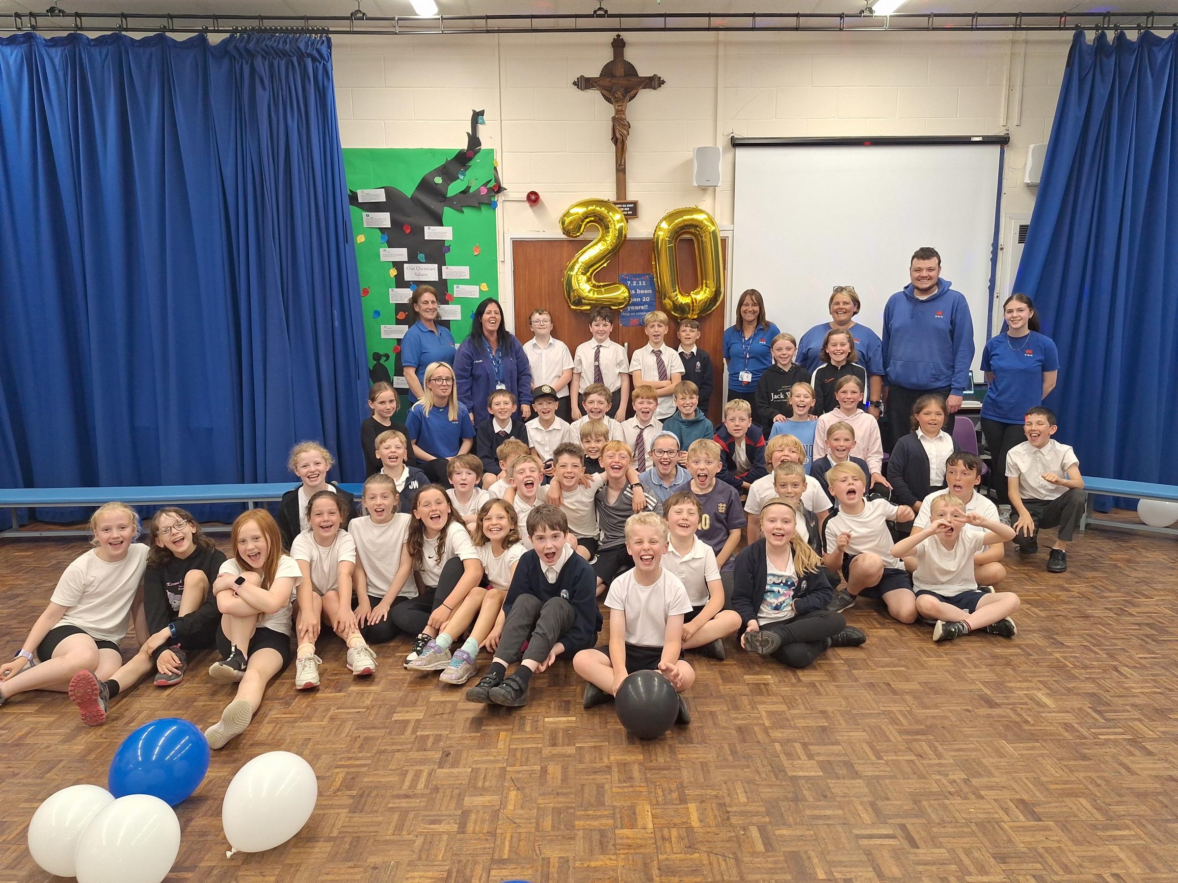 Celebrating 20 years of breakfast club and after school club at Hawarden Village Church School.