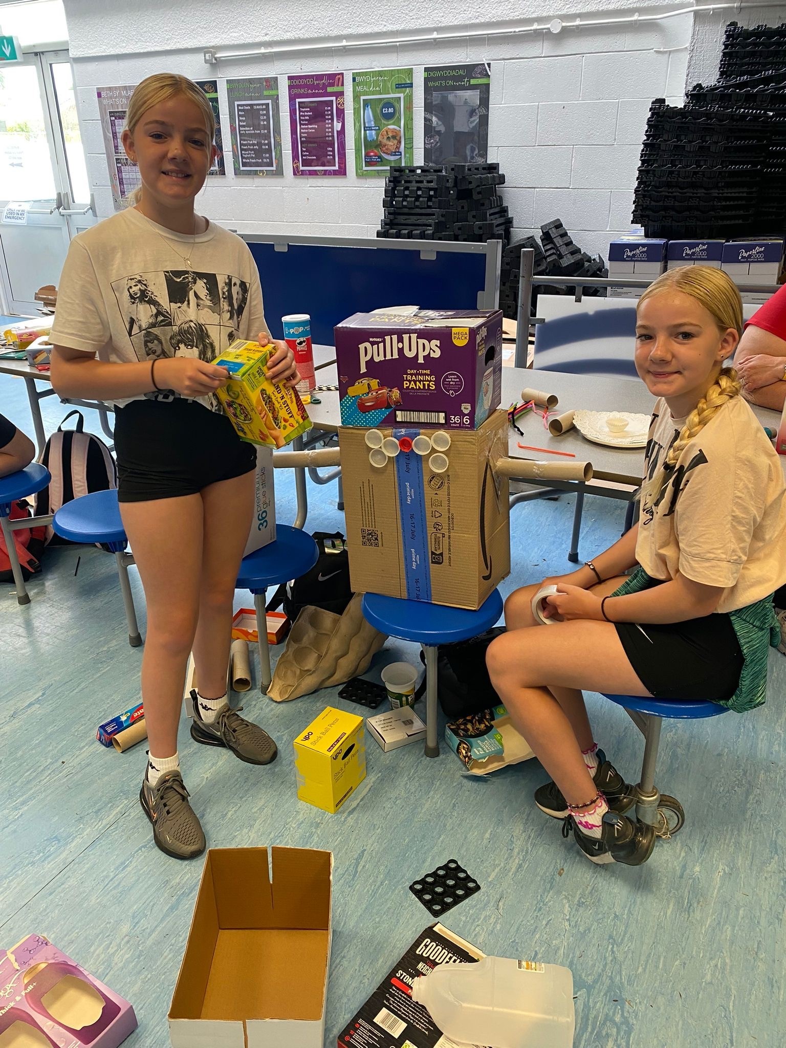 Autumn and Isabelle Walker get creative with recycling in a junk modelling session. 