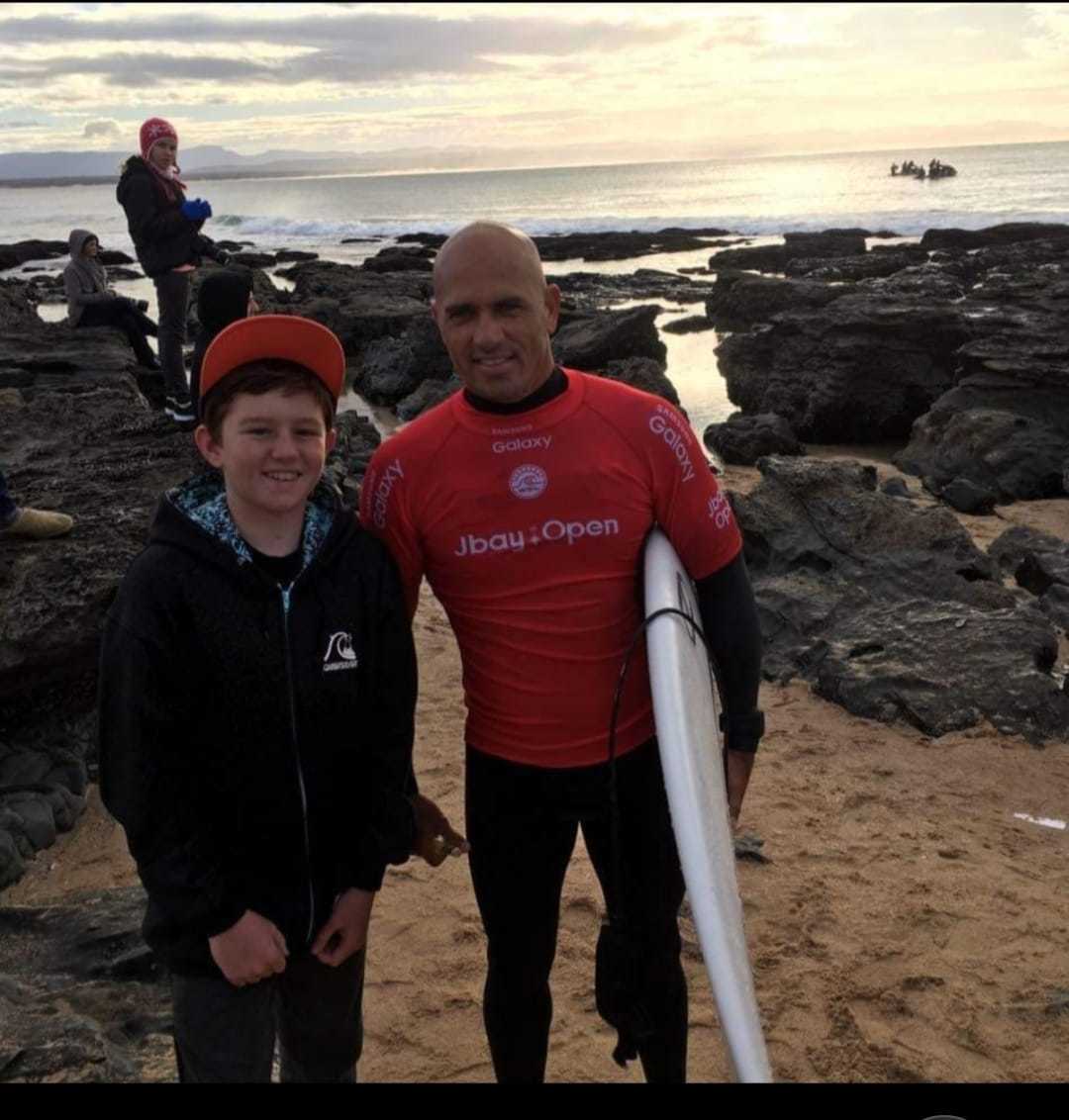 Mark Rowley: My son with Kelly Slater... the GOAT surfer.