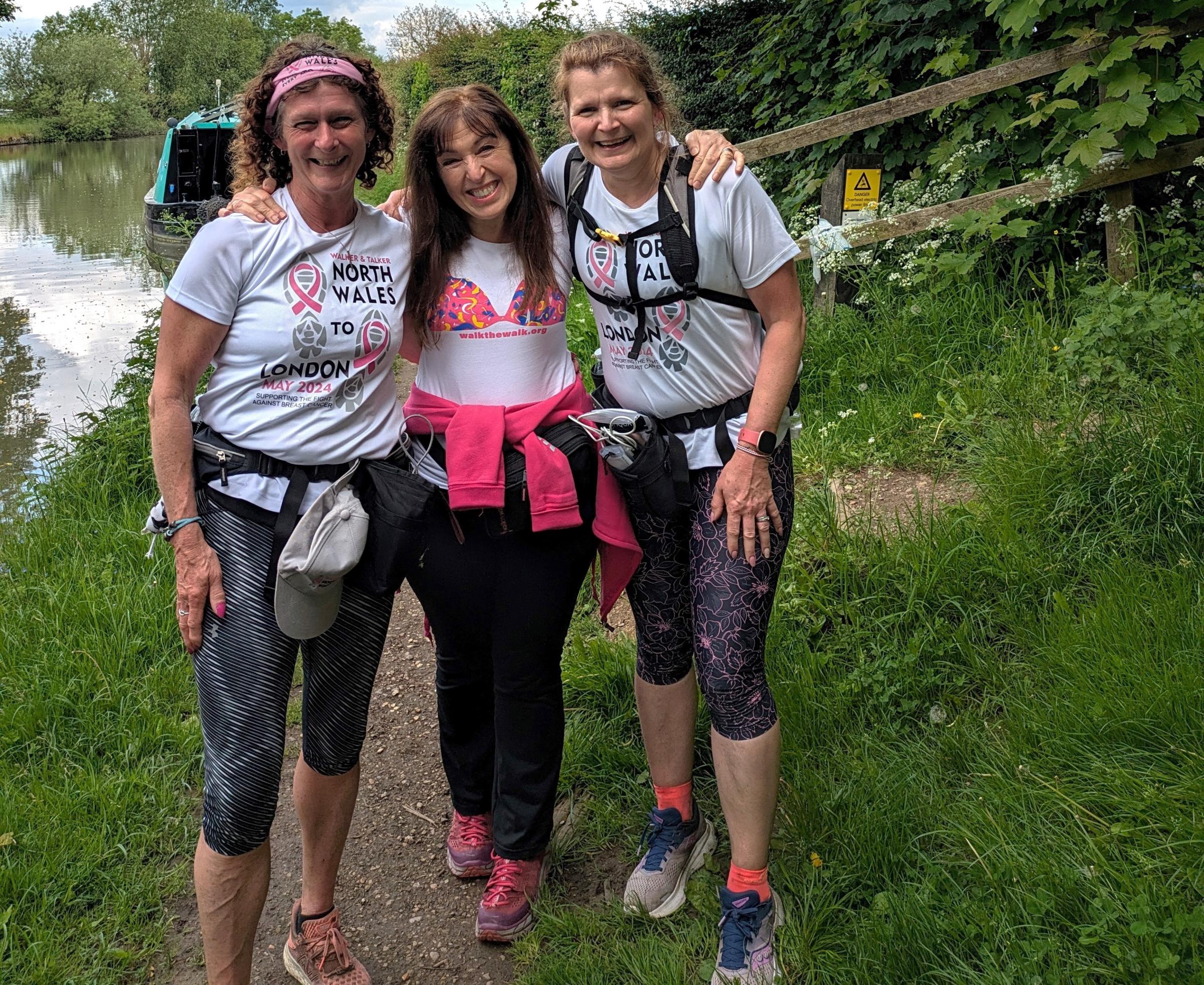 Lucy Cummins and Gynette Janney meeting the founder of cancer charity Walk the Walk Nina Barough CBE (centre) during their 7 Ultras in 7 Days challenge.