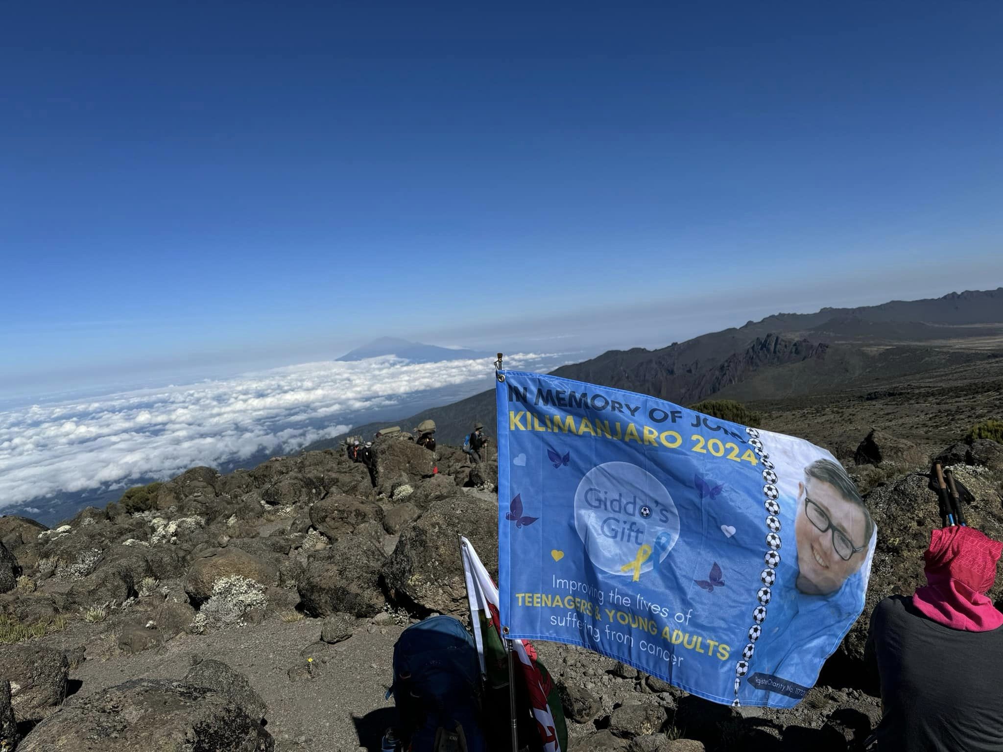 Giddos Gift flag on Kilimanjaro summit.