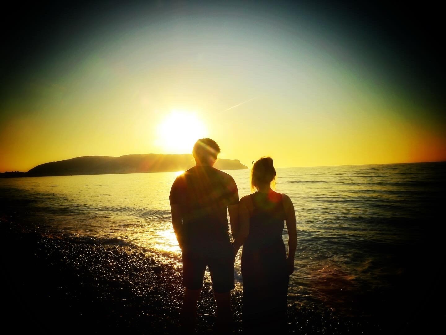 Son and daughter-in-law watching the sunset at the Little Orme, Llandudno. Photo: Samantha Jayne Davies