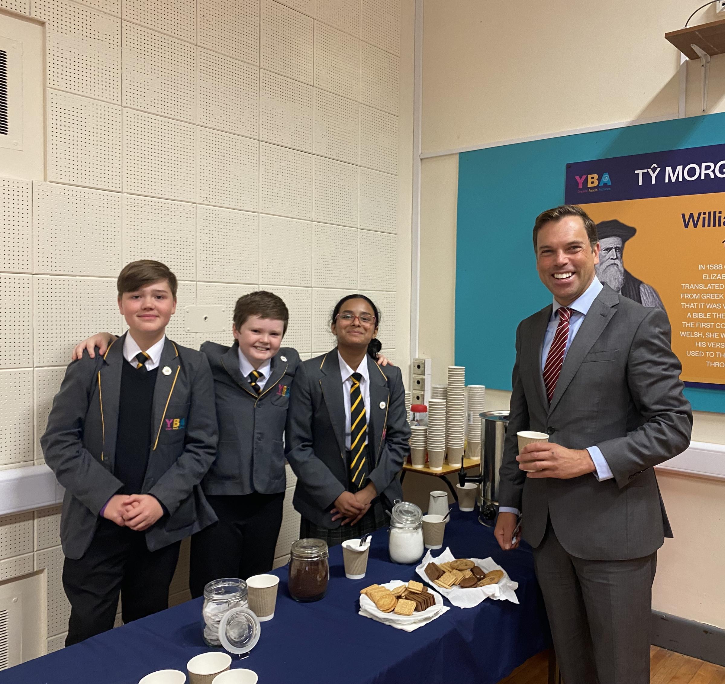 Year 8 pupils that helped with tea and coffee, Lucas Francis, Ben Langton and Rayyan Faisal, with Ken Skates.