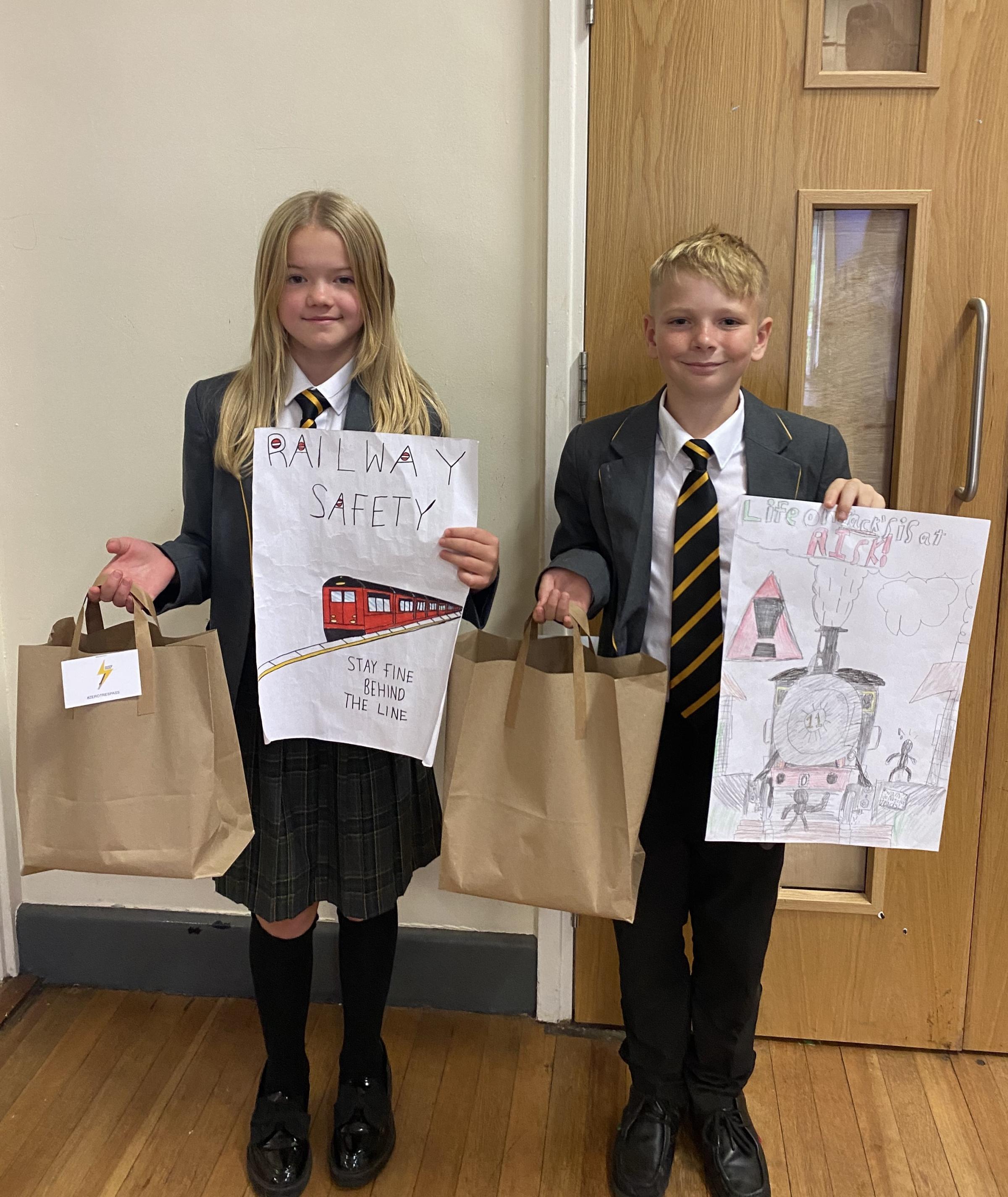 Year 7 poster competition winners Ruby Edwards and Jenson Mitchelmore.