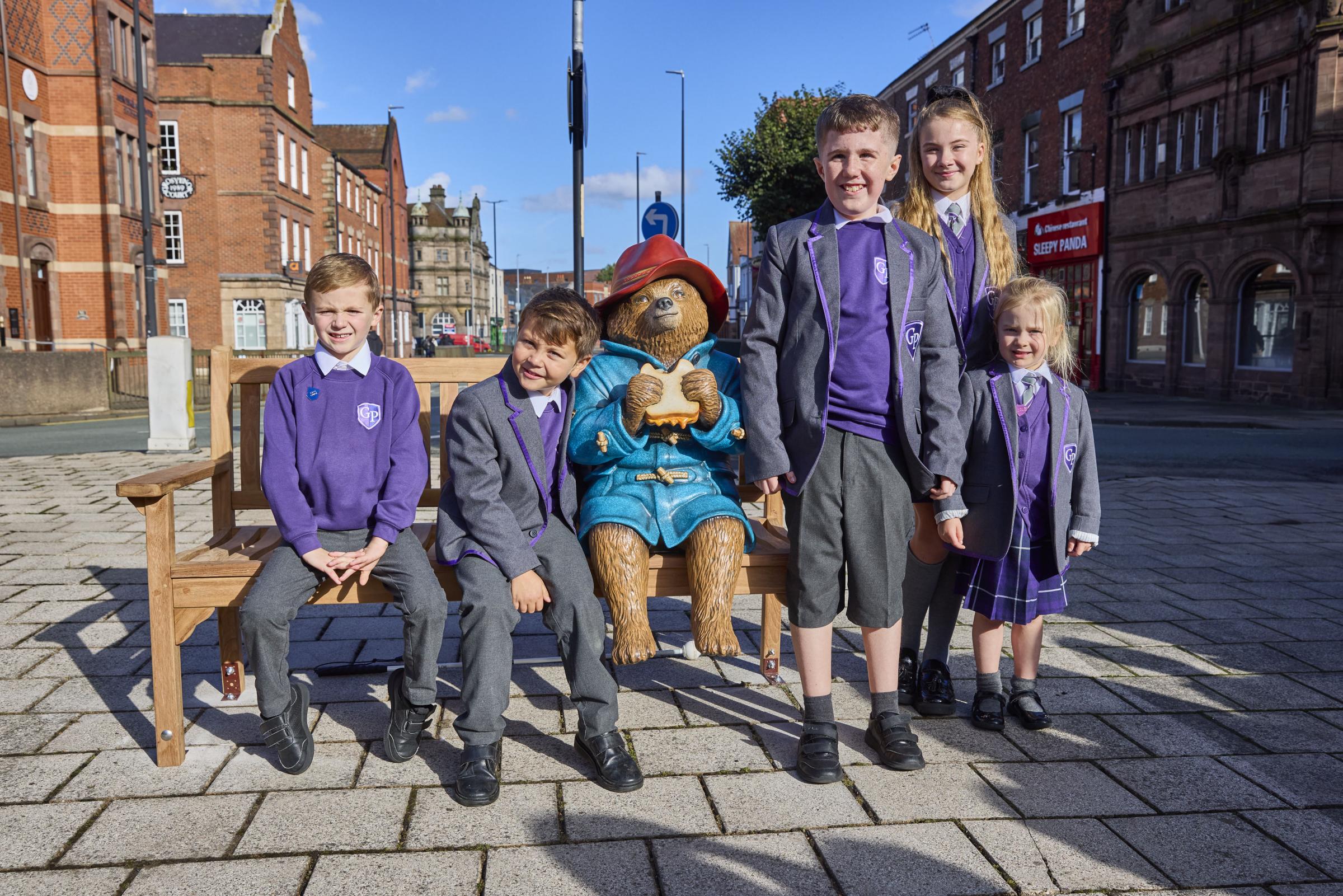 Grosvenor Park Academy pupils performed the official unveiling of Paddington on Monday.