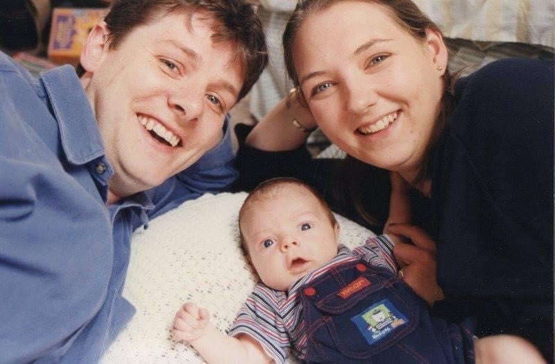 Samuel Snowden as a baby with his parents Andy and Janet Snowden.