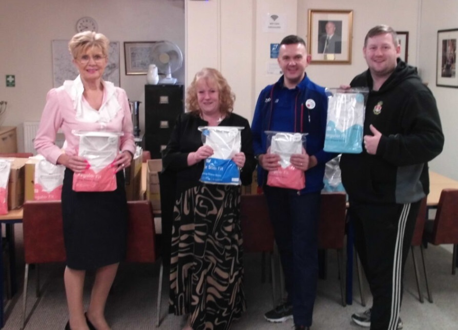 Cllr Gaynor Wright, Cefn Council, headteacher Melanie Ferron-Evans, David Roden of Tesco Cefn Mawr and Andrew Ruscoe, Cefn Council.